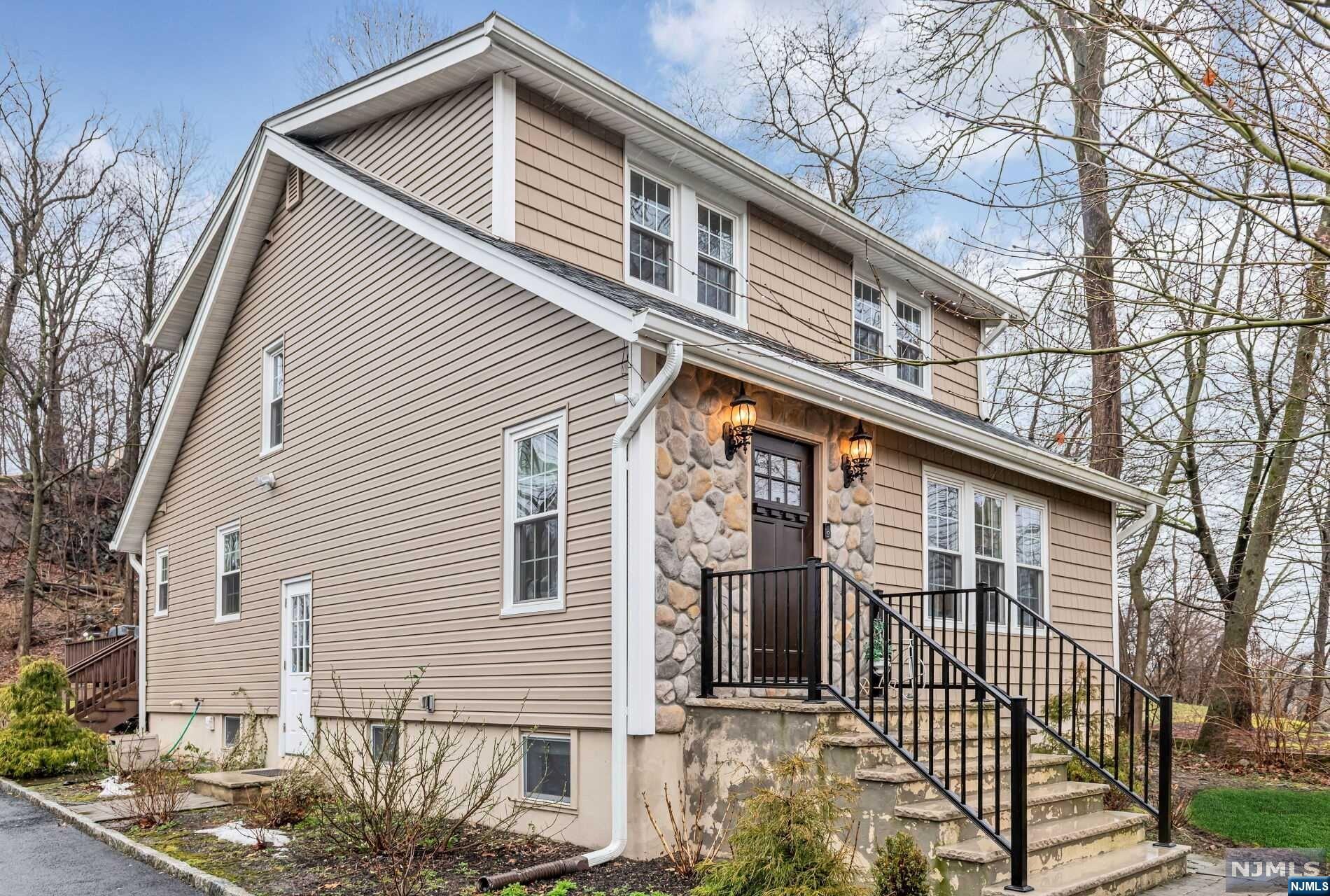 Pristine and meticulously maintained, this open-floor plan Colonial, remodeled in 2019, boasts three floors of finished living space ready for all of your lifestyle needs! Sunny entry leads to a first floor with open floor plan: LR w/wood-burning fpl; Dining Area, Full bath and Kitchen with center island, stainless steel appliances, recessed lights and generous counters and cabinetry! French doors to a huge deck; overlooking fire-Pit and private large yard (.55 ac)! Upstairs finds Primary Bedroom and two other good-sized BR's and lg hall bath! Lower level offers Rec Rm, Storage Rm and Laundry. Expansive driveway holds approximately 12 cars; playground a block away at Centennial Park; close to schools, shopping and hwy access! Lincoln Park has three options for high school: Boonton, Pequannock or Morris Vocational Tech. No flood!! Selling in as-is condition! Come take a look at this beautiful move-in ready home!!