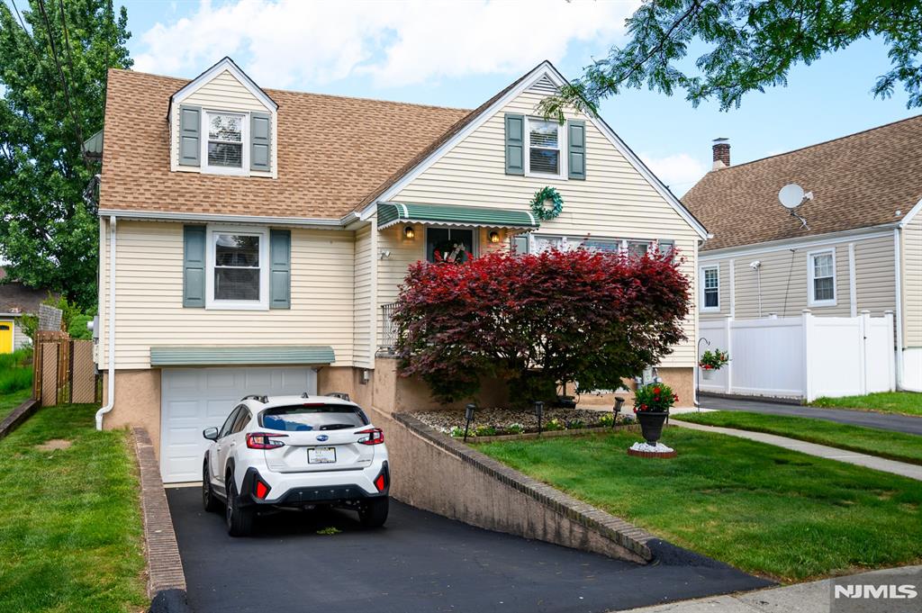 Step into this beautifully maintained, fully updated two-family home that offers the perfect blend of space, comfort, and versatility. The first unit features a bright living room, a spacious updated eat-in kitchen, two bedrooms with tons of closet space, a new full bath, and a versatile den with direct access to the backyard. The second unit features an open-concept layout where an updated eat-in kitchen flows effortlessly into the living room, a large bedroom with ample storage and a new full bath. Beautiful hardwood floors run throughout the home, adding warmth and charm. The basement is fully finished and adds functionality with its large family room, full bath, laundry room, utility space, and a cedar walk-in closet. The large backyard is great for entertaining and everyday living, featuring a patio, and an above-ground pool. Additional highlights is a 1-car garage with a brand-new door, and a driveway that accommodates three additional vehicles. Recent updates include a new floor, updated kitchens and bathrooms, new hot water heater(less than 1 yr), newer central air (2024). This turn-key property will not last longâ€”make it yours today!