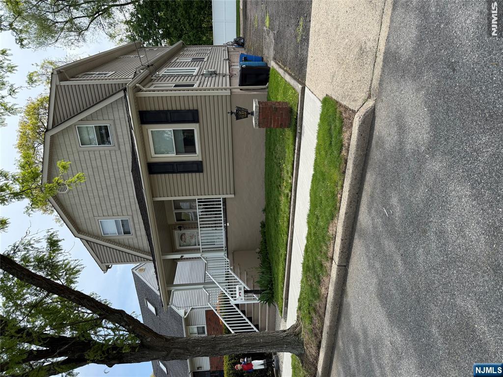 Lovely large colonial situated on an oversized lot in the heart of Rochelle Park. First floor of this home offers a large living room with an attached den/office, dining room, kitchen, bedroom, laundry room and full bath. the Second floor offers a primary bedroom, 2 additional bedrooms and a full bath. THE UPSTAIRS BEDROOMS ARE CURRENTLY BEING USED AS ROOMS FOR CRAFTS AND STORAGE. The basement is unfinished and offers a storage area. The large yard is professionally landscaped and the driveway can accommodate many cars for your parking needs. Located on a quiet street, close to shopping and public transportation, schools and places of worship. A MUST SEE!
