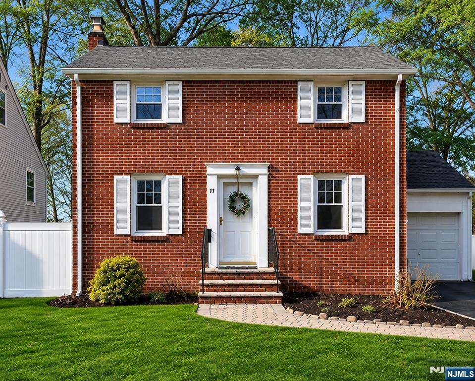 LOCATION, LOCATION, LOCATION! Welcome to this beautifully updated 3BR, 2.5BA Colonial on a quiet, tree-lined street in one of Roseland's most desirable neighborhoods. Featuring a flexible floor plan, low taxes, top-rated schools, and timeless charm, this move-in ready home offers refinished hardwood floors, fresh paint, abundant natural light, a wood-burning fireplace, French doors, and a cedar closet. The updated kitchen with newer appliances flows into the main living areas. A first-floor primary bedroom and laundry offer the ease of one-floor living, while upstairs features two spacious bedrooms, a full bath, and adjoining half bath. Recent updates include a new roof, updated windows, a partially finished basement with new basement windows, newer appliances, and a new fence. Private backyard with deck, storage shed, and protected easement. Convenient to parks, shopping, dining, and major commuter routes.