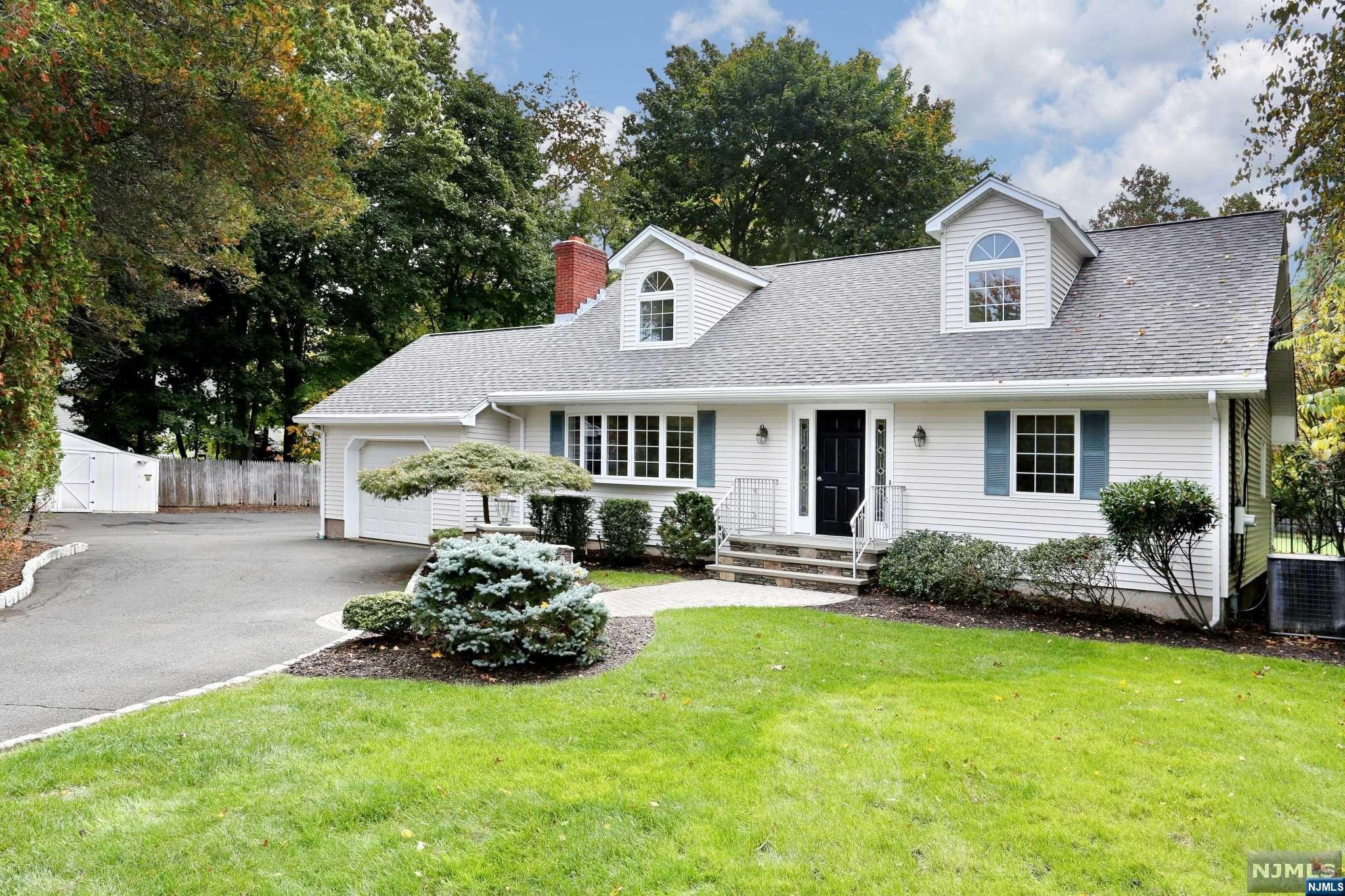 COME AND VIEW THIS SPACIOUS AND BRIGHT, 5 BEDROOM, 2.5 BATH CUSTOM EXPANDED CAPE COD STYLE HOME. SET BACK OFF THE ROAD ON A PRIVATE .37 ACRE PROPERTY. MANY NEWER UPDATES THROUGH OUT. ENTER INTO THE MAIN FLOOR, LIVING RM WITH WOOD BURNING FIREPLACE, FORMAL DINING RM, MODERN EAT IN KITCHEN WITH DOORS TO A LARGE PRIVATE REAR DECK, HALLWAY FULL BATH/SS, OFFICE/BEDROOM/DOORS TO REAR DECK, BEDROOM. THE 2ND.FLOOR OFFERS A PRIMARY BEDROOM WITH A HALF BATH, HALLWAY FULL BATH/SOT, 2 MORE BEDROOMS. THE FULL BASEMENT IS PARTIALLY FINISHED, LAUNDRY AREA, UTILITIES AND PLENTY OF STORAGE. THERE IS A ONE CAR ATTACHED GARAGE AND A 2 CAR DETACHED GARAGE AS WELL. EXTRA LARGE PARKING AREA. IN CLOSE PROXIMITY TO SCHOOLS, SHOPPING AND PUBLIC TRANSPORTATION. THIS HOME IS TRULY A TURN KEY MOVE IN CONDITION !!A MUST SEE.