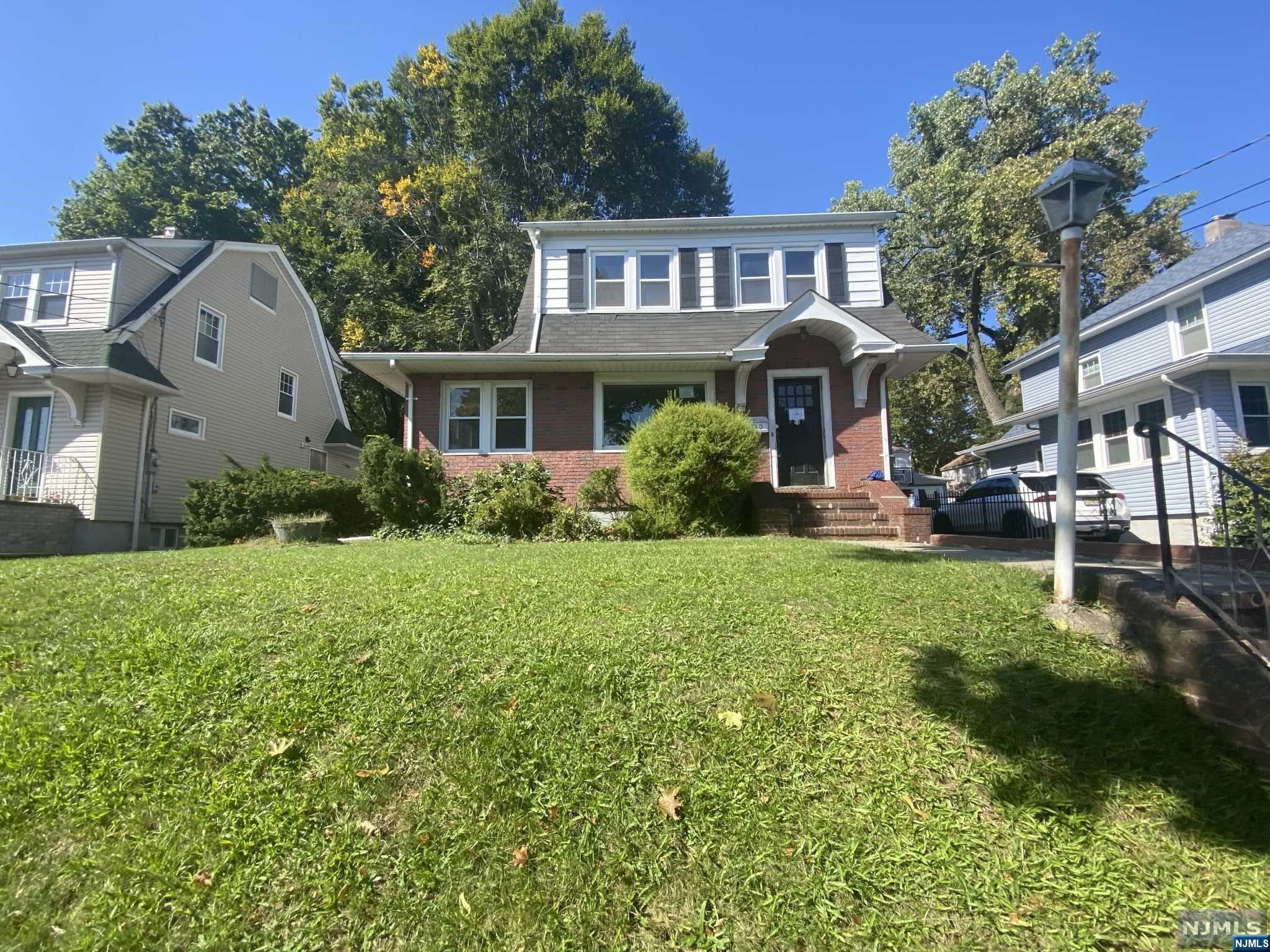 Opportunity awaits! Light filled, flowing side hall colonial featuring wood-burning fireplace, first floor den, formal dining room, and 3 comfortable bedrooms. Great location in town.