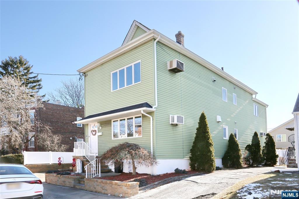 Welcome to this 2 family home located in Garfield. The first floor features a brand new kitchen, dining room, living room, and 2 large bedrooms. The second floor is fully carpeted, kitchen, dining room, living room, 2 large bedrooms, and a full bath. The home also features a finished basement, an attic for storage, 3 car driveway, and large back yard, perfect for entertaining. Prime location for transportation, parks, schools, and shopping. Home is being sold contingent on seller buying new property. HIGHEST AND BEST DUE THURSDAY 2/6 BY 5:00PM.