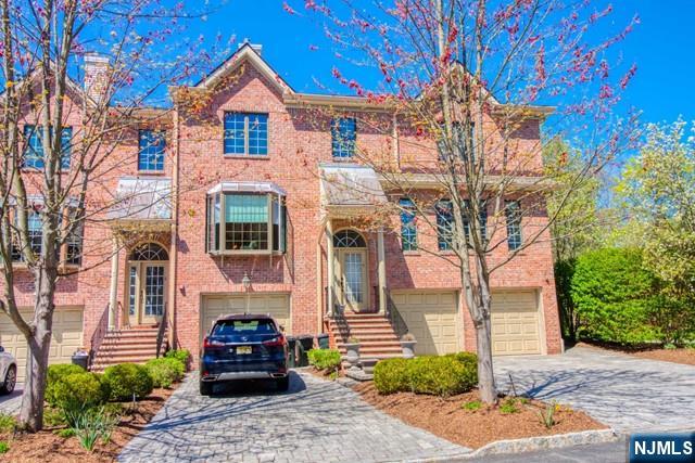 This beautifully maintained rental offers spacious and comfortable living in a quiet cul-de-sac location. Featuring 3 generously sized bedrooms and 2.5 baths, this home is perfect for anyone seeking space, functionality, and a serene setting. The main level offers a bright and airy layout with a large formal living room, a cozy family room with fireplace, and an updated eat-in kitchen with modern appliances and access to a lovely patio backyard â€“ perfect for entertaining or relaxing. Hardwood floors throughout add warmth and character. Upstairs, you'll find a spacious primary suite with a private bath, along with two additional bedrooms and another full bathroom. Additional highlights include central air, a full basement with laundry, and a 1-car garage. Located in a sought-after neighborhood with top-rated schools, parks, and easy access to transportation. Donâ€™t miss this rare rental opportunity in one of Bergen Countyâ€™s most charming communities!