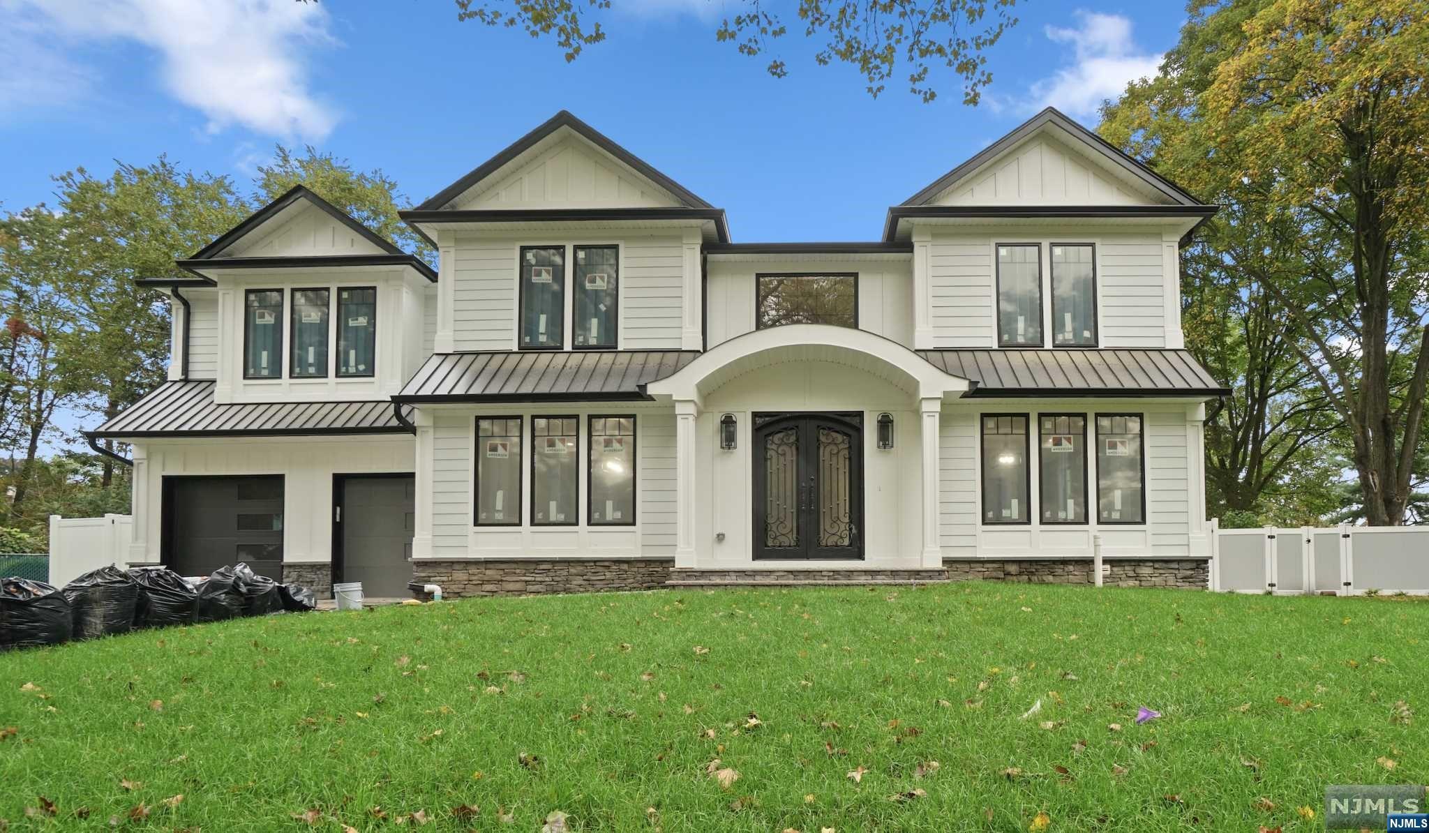 New Constr Exst Fndtn home by one of Paramus' Top Builders, NJ North Dev just completed! This home sits on an almost 15k sqft lot in the heart of Paramus. Your doors open to a Dramatic 2-story foyer, formal LR & DR, 2-story family rm w millwork & fireplace, dry bar which flows into your Chef's kitchen w/ Top-Line SS Appliances, Cabntry, Butler's pantry, Island & Granite Countertops accented w/ lux porcelain backsplash & accent lighting. 1st flr also consists of pwdr rm, mud rm and HUGE guest suite with full bthrm. 2nd flr consists of HUGE primary suite w/ high ceilings throughout, custom millwork & fireplace, w/i closets, and your spa like primary bath w soaking tub, porcelain tile, double vanities, top line fixtures and heated floors. 4 addtnl bdrms w/ ensuite bthrms & lndry rm complete your 2nd flr. Huge fin. bsmnt w/ HBth, Theater Rm, Dry Bar & Rm for a Gym/Office. Attchd 2 Car Garage, patio and fenced backyard fit for pool