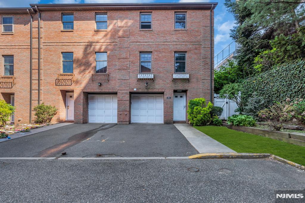Back on Market!! Welcome to this lovely, spacious 3-bedroom, 3-bath townhouse in North Bergen! Close to everything, this bright and sunny home offers three levels of comfortable living space. The first-floor entry level features an inviting foyer, access to the garage, a full bathroom, and a versatile office that can also be used as a bedroom, along with a walkout to a spacious patio and garden area in the back. The second floor offers an open-concept layout with a large living room, dining area, and an eat-in kitchen complete with stainless steel appliances â€” perfect for everyday living and entertaining. The third floor features three generously sized bedrooms, including a renovated en-suite primary bathroom, as well as an updated hallway bathroom. There is also a washer/dryer hookup conveniently located on the bedroom level, in addition to the current washer and dryer setup in the garage. Commuters will love the convenience of a bus stop located right at the entrance of the development, with approximately a 20-minute commute to Port Authority. The light rail station to Jersey City is less than a mile away. As an added bonus, the home is approximately a one-mile walk to the Hudson River waterfront, Weehawken, and Hamilton Park â€” the perfect spot to enjoy the NYC Macyâ€™s Fourth of July fireworks show. Move right in and enjoy all that this wonderful location and home have to offer!