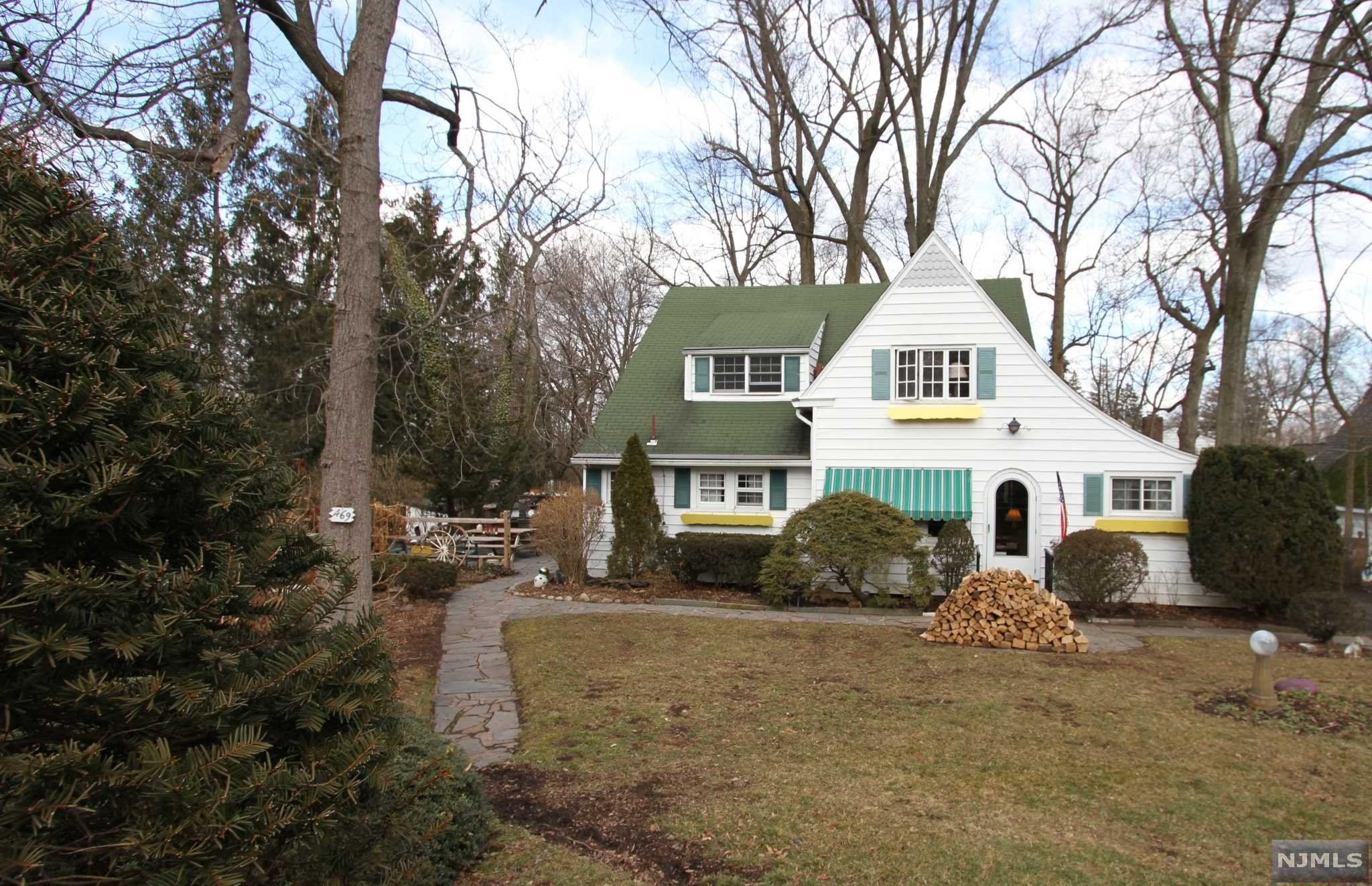 Warmth, character and charm abound in this spacious home situated on almost a half acre of property, awaits your updates and cosmetic changes. A diamond in the rough worth updating and is being sold as is. Retired landscaper/owner has designed property with Bluestone walkways with pink cement paths and yellow brick walkways leading to private and separate areas: partially covered patio, stone BBQ, natural garden with wild Raspberries, Shed with antiques and pot belly stove, 2 covered planting sheds, 14" deep Koi Pond as is, brick patio, etc. A seasonal escape after work and on weekends! Consider the possibilities: conversion of shed into outdoor bar... entertain with themed parties, etc. A touch of Sugar Loaf in NJ! Large living room with fireplace. Cozy dinette and country eat-in kitchen. Huge second floor Master Bedroom with adjoining sitting room/office and dual entry bath with second bedroom. Must see inside and property to truly appreciate.