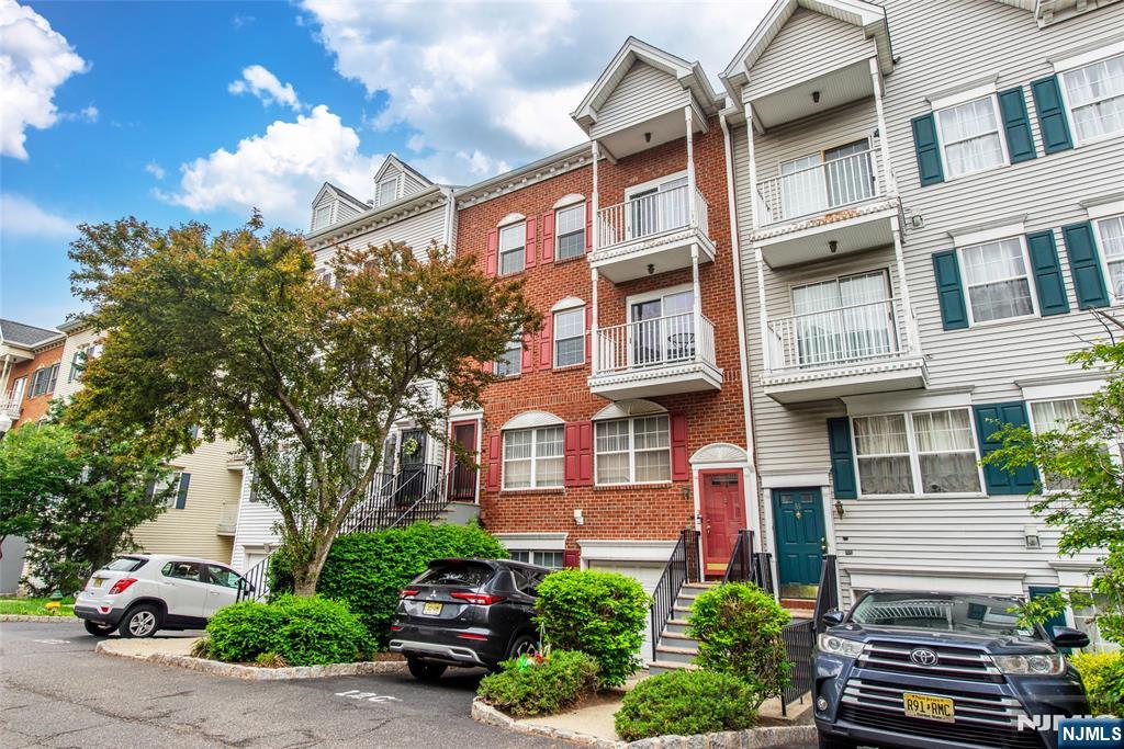 Experience this recently Renovated in 2025, 2 Bedroom, 2.5 Bathroom Townhome situated in a PRIME LOCATION in highly sought-after Society Hill at University Heights Community. Offering an Open-Concept Floor Plan featuring Two Balconies, a spacious Living Room with Wood-Burning Fireplace, 2025 updated Eat-In Kitchen, Dining Room, and a 1-Car Garage making this Unit an Entertainers Dream! Enjoy 2 spacious Bedrooms including a Primary Suite with En-Suite Bathroom with Dual Vanity sink, private Balcony & Walk-In Closet seamlessly blending contemporary living and comfort. Reap the benefits of private community living with incredible amenities featuring Tennis Courts, an In-Ground Swimming Pool, Clubhouse, and onsite 24-hour security & onsite management. Within walking distance to Rutgers, NJIT, Newark Vocational High School, University Hospital. Easy access to NYC, mass transit, major highways, and shopping.