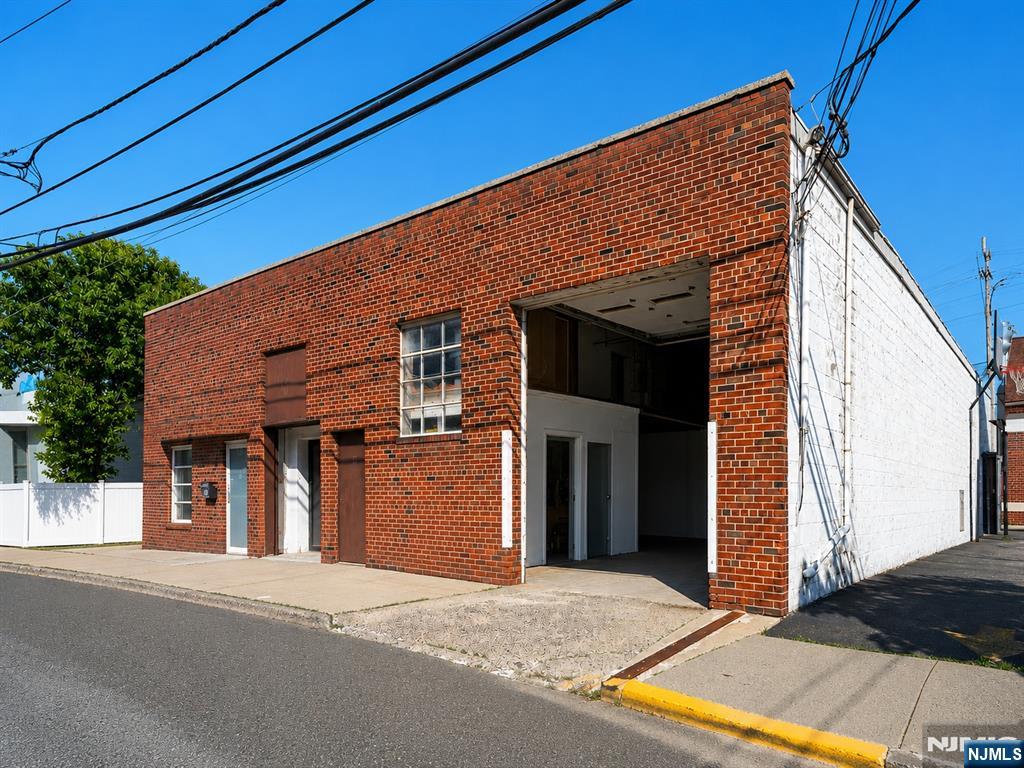 Exceptional opportunity to acquire a vacant industrial warehouse property in one of Bergen County's most sought-after industrial corridors. Offering approximately 6,000 square feet of versatile space, the building features 16-foot clear ceilings, a grade-level drive-in door, and a functional layout suitable for a variety of owner-user, warehouse, distribution, light manufacturing, storage, and service-oriented operations. Delivered vacant at closing, the property provides immediate occupancy and flexibility without the constraints of existing tenancy. Its strategic location offers convenient access to major highways, New York City, and the surrounding Northern New Jersey marketplace, making it an attractive option for businesses seeking operational efficiency and long-term value. Industrial properties of this size remain increasingly difficult to find in Bergen County, creating a rare opportunity for both owner-users and investors to secure a highly functional asset in a supply-constrained market.