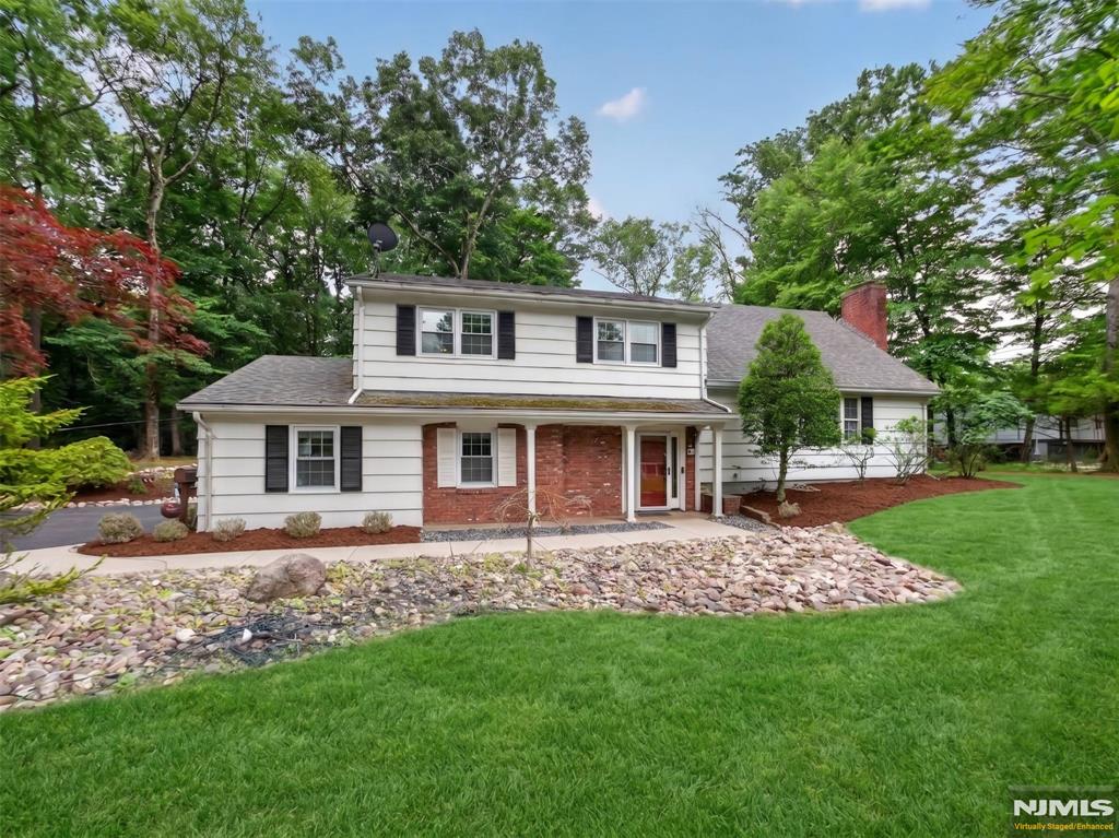 Set on a truly special property with over one acre of land overlooking Van Gelders Pond, this home offers a rare opportunity to create your dream home in an incredible setting. From the moment you pull up, you can feel the potential. The entry foyer opens to a welcoming family room with sliders leading out to the patio, expansive yard, and peaceful pond views. This level also offers access to the two-car attached garage, a large powder room, and laundry area. Just a few steps up, youâ€™ll find a spacious living room with a picture window and fireplace, flowing nicely into the dining room and eat-in kitchen. A few steps above that is the current primary bedroom with a full bath, along with two additional bedrooms and a full hall bath. The upper level features a huge bonus room with stunning views overlooking the yard and pond, plus another large bedroom. This space offers incredible potential to become a future primary suite, private retreat, or flexible living area. A finished basement completes the home, adding even more usable living space. With its beautiful property, special views, and endless possibilities, this home is ready for your vision and personal touches to make it something truly exceptional. ****CORRECT 2025 TAXES ARE $18,172*** - WANT MORE INFO CONTACT LISTING AGENT NICOLE MINETTI @ 201-388 -0077 //nicole@minettidennisroup.com