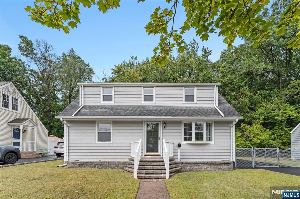This beautifully renovated home is nestled on a quiet street, offering the perfect blend of comfort and convenience. With 4 spacious bedrooms and 2 full bathrooms, this home provides ample space for household living. The fully finished basement adds even more room for recreation, storage, or customization to suit your needs. The brand-new kitchen, complete with modern appliances, is a chef's dream and features easy access through the backyard, perfect for outdoor entertaining or quick entry. Additionally, the detached garage comes with a generously sized room, offering endless possibilities as a studio, office, or even a small business space for storage or work. With easy access to the highway, this home is ideally located for quick commuting and convenience. This charming property is move-in ready, combining modern updates with a peaceful location!