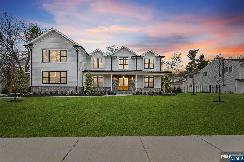 Call Jason Pierce direct: 201 397 5888. A true masterpiece of design and craftsmanship on the east hill of Closter. Stunning 8000 sqft house with 6 spacious bedrooms and 7.5 bathrooms. The exterior is a sophisticated blend of Hardie shingle & stone, w metal & shingle roofing. Wide plank white oak flooring flows seamlessly throughout. The custom imported Italian kitchen is a chef's dream featuring high-end cabinetry, appliances & finishes. A beautifully designed wine cellar awaits, ready to house your finest collections. Entertain with ease in the expansive living areas, which include a fitness room and a bar for hosting guests. 3-car garage w/ EVC provides ample space for vehicles and storage. Every detail in this home is meticulously curated to offer unparalleled luxury and comfort. Owner has RE license and is listing agent. The VIRTUAL TOUR link contains a comprehensive room by room video tour, additional photos, floor plans, and a complete interactive 3D model of the home.