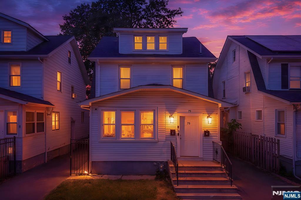 Welcome to 79 Delmar Place, a well-maintained 2-family home situated on a quiet residential street in Irvington. Offering a total of 5 bedrooms and 3 full bathrooms, this versatile property presents an excellent opportunity for both owner-occupants and investors. The first-floor unit features a bright living room, eat-in kitchen, and comfortable bedroom layout, while the second unit spans multiple levels, providing additional living space and flexibility. The finished basement includes the home's third full bathroom, adding valuable bonus space for a variety of uses. Additional highlights include a private driveway, garage, and backyard, offering both convenience and outdoor enjoyment. Ideally located near major highways, public transportation, schools, parks, and shopping, this property combines functionality, location, and strong investment potential.