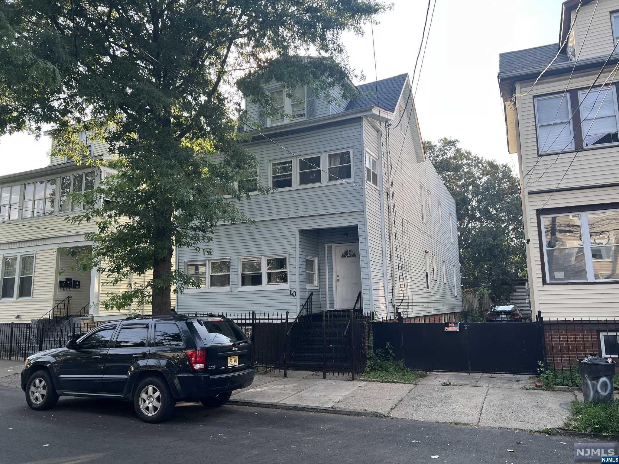 Welcome to 10-12 N 12th Street, Newark, NJ - a fantastic opportunity to own a spacious and versatile 2-unit home in a desirable neighborhood in the booming city of Newark. This property boasts a 2-car garage, a generous backyard, and two well-appointed 3-bedroom apartments. Additionally, a full unfinished basement offers ample potential for expansion and customization to suit your needs. This well maintained 2-unit home is nestled in a quiet and well-established neighborhood, offering both convenience and tranquility. You'll have easy access to schools, parks, shopping, and public transportation. The two-car garage which is a rare find provides secure parking for your vehicles and additional storage space for all your belongings. Enjoy outdoor living at its finest in the generously sized backyard. Whether you dream of gardening, hosting BBQs, or simply relaxing in the open air, this space has endless possibilities.
