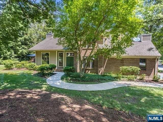 Longview's desirable Sotheby Model. One of the original model homes which is apparent with all its unique extras. Open floor plan with windows galore and cathedral ceilings will impress the most discerning buyer. Upon entering you will be greeted by abundant natural sunshine. The marble tile floor with custom carpet is stunning and introduces the format dining room with tray ceiling and living room door leading to deck and private yard. The beautiful updated eat-in kitchen will impress any gourmet. Beautiful granite countertops with brand new stainless steel appliances and lighted cabinet adds the perfect touch of elegance. This home includes 3 bedrooms with California closets and 3 1/2 baths. The primary suite on the main floor has a spa-like bath and an additional fireplace. The upper level will continue to impress with a large loft overlooking the formal living room. Two large bedrooms with an updated bath and hardwood floors throughout. There is a fully-finished basement Bath