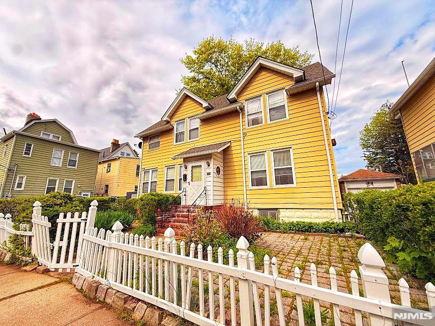 Welcome to this charming single-family home in the heart of Bloomfield! This well-maintained residence offers 3 spacious bedrooms, 1 full bath and 1 half bath, perfect for comfortable living. Step inside to find a bright and inviting living area filled with natural light, flowing seamlessly into a formal dining room ideal for entertaining. The kitchen features ample cabinetry and functional layout, ready for your personal touch. Upstairs, you'll find generously sized bedrooms and a full bath. Additional highlights include hardwood floors and potential living space. Conveniently located near parks, schools, shopping, and transportation, this home offers both comfort and accessibility. A great opportunity to own in one of Bloomfield's desirable neighborhoods! Major improvements Include: Rear Roof 2009, Front roof 2011, Solar panels Financed 2023, Water heater 2022, Furnace 2009, Finished Basement 2011