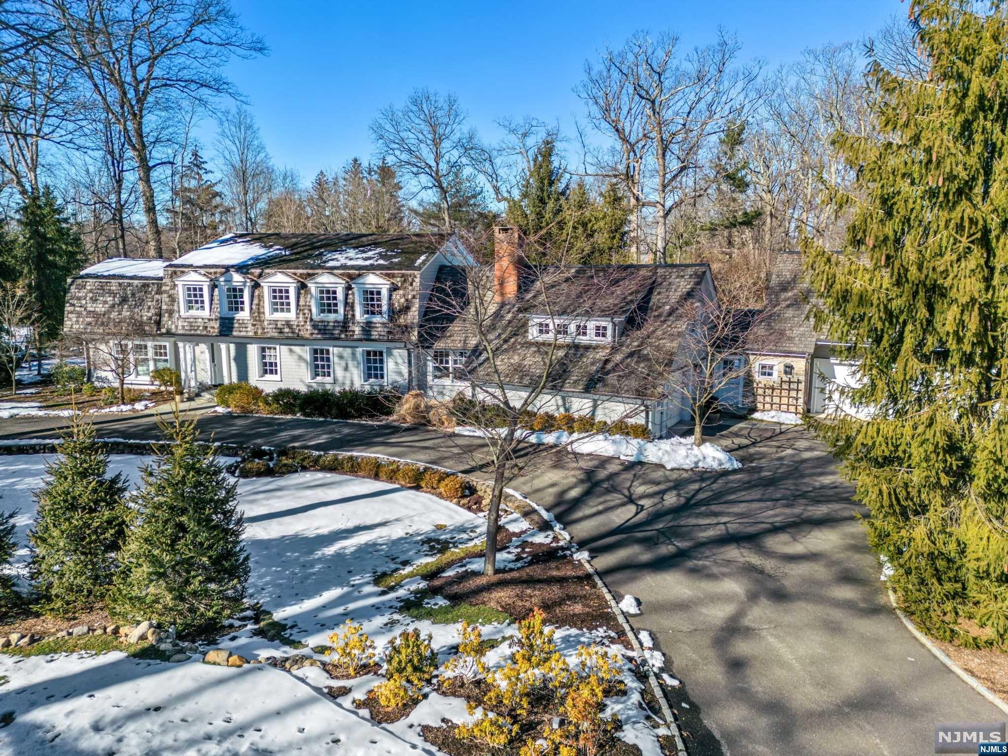 Welcome to 865 Apache, where timeless elegance and careful craftsmanship converge to create an extraordinary living experience. Nestled on one of Franklin Lakes' most coveted streets, this magnificent residence, lovingly curated by its owners of more than 30 years, exudes sophistication and charm. W/over 7000 sf, this unique home boasts a seamless fusion of intimate and updated spaces ideal for daily life and entertaining. Maybe it's the accommodating kit, the serene den, or the inspiring artist studio...each space beckons you to create your own narrative. With 5 beds, including a luxe 1st-floor primary suite, 4.5 bths, and a host of gathering spaces, this residence offers a canvas for your life. Step outside to a private yard for exceptional outdoor living, complete with a heated gunite pool and meticulous acreage. Perfectly situated in South Gate near Indian Trail Club, Franklin Lake, hiking trails, and other hidden town gems, this is more than a home, it's a lifestyle!