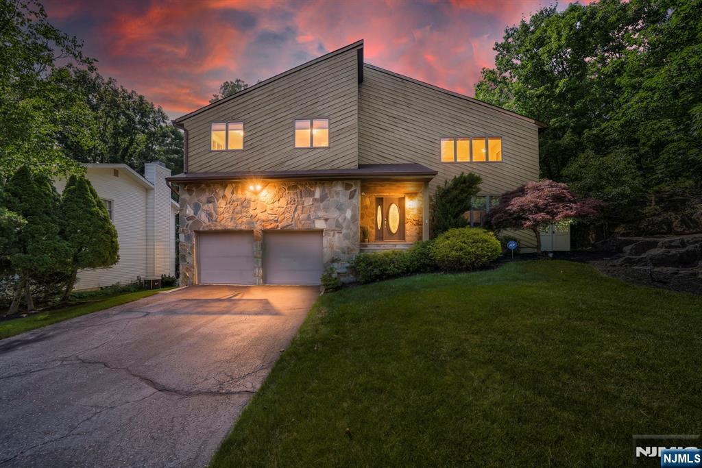 Welcome to 72 Agawam Drive â€” a distinguished 3,475 sq ft colonial with contemporary flair set on one of Wayne's most coveted streets. This exceptional 4-bedroom, 3.5-bath home features hardwood floors, a gourmet kitchen with Silestone countertops and GE Profile appliances, and a family room with fireplace opening to a two-tier deck with awning. The extraordinary 19×26 primary suite boasts vaulted ceilings, a spa bath, and two custom walk-in closets. The finished walkout basement offers a kitchenette, breakfast bar, two entertaining areas, full bath, and laundry. Outside, a private saltwater gunite heated pool and fully fenced yard create a true backyard oasis. Situated in the acclaimed Wayne Township School District â€” bus service to two schools, walk to Wayne Hills High School. HOA just $350/year covers pond, tennis courts, and entrance signage only â€” no restrictions. Near shopping, dining, parks, and NJ Transit to NYC.
