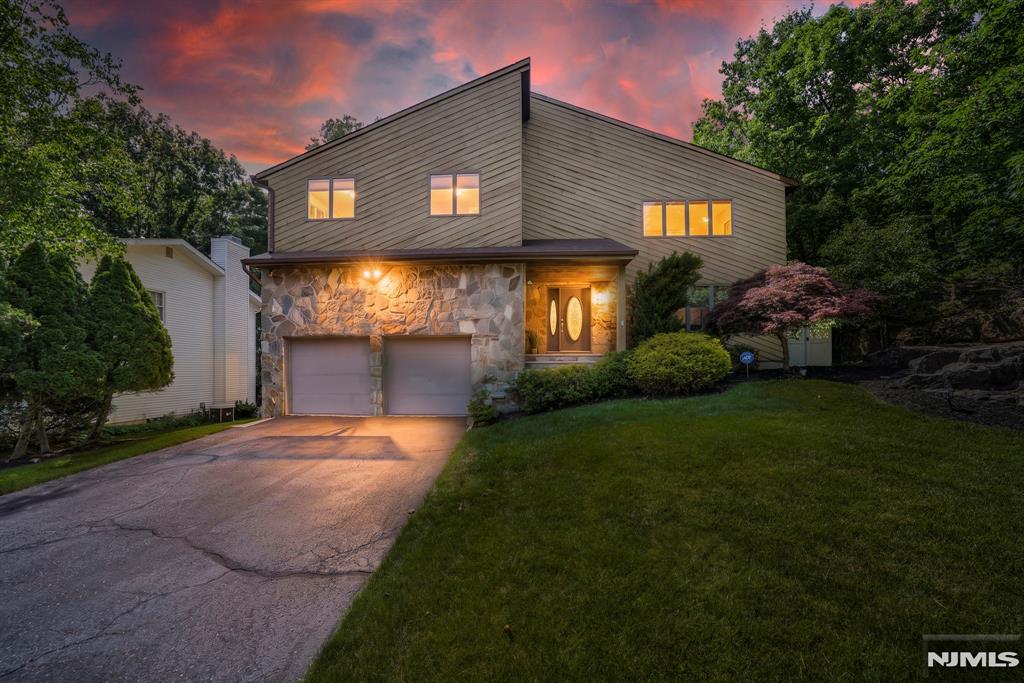 Welcome to 72 Agawam Drive â€” a distinguished 3,475 sq ft colonial with contemporary flair set on one of Wayne's most coveted streets. This exceptional 4-bedroom, 3.5-bath home features hardwood floors, a gourmet kitchen with Silestone countertops and GE Profile appliances, and a family room with fireplace opening to a two-tier deck with awning. The extraordinary 19×26 primary suite boasts vaulted ceilings, a spa bath, and two custom walk-in closets. The finished walkout basement offers a kitchenette, breakfast bar, two entertaining areas, full bath, and laundry. Outside, a private saltwater gunite heated pool and fully fenced yard create a true backyard oasis. Situated in the acclaimed Wayne Township School District â€” bus service to two schools, walk to Wayne Hills High School. HOA just $350/year covers pond, tennis courts, and entrance signage only â€” no restrictions. Near shopping, dining, parks, and NJ Transit to NYC.