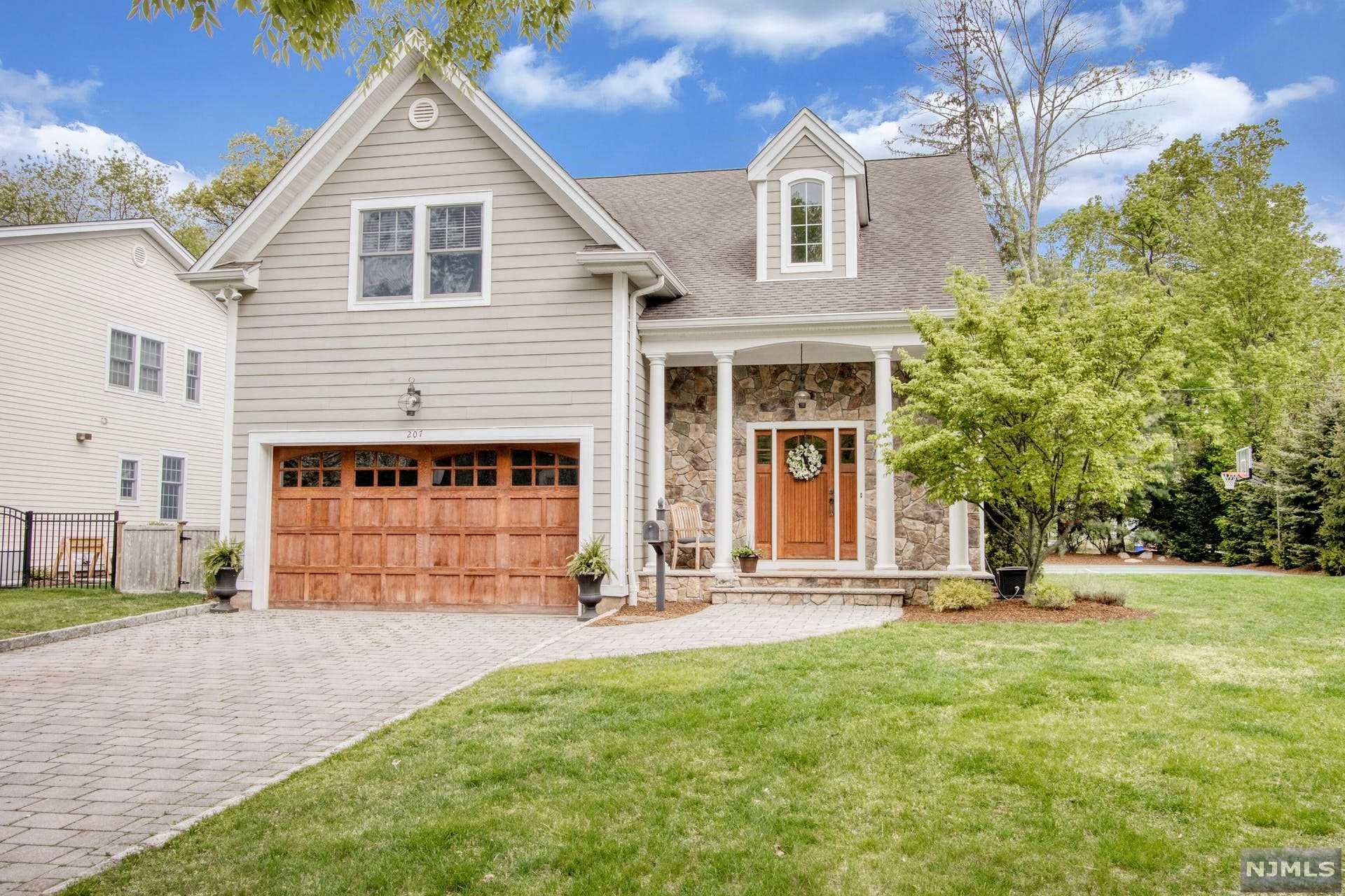 Exquisite Young Colonial, in sought after neighborhood, with open floor plan and luxurious finishes throughout! Welcoming foyer leading to a beautiful open concept on the first level. Large and bright sitting area and living room featuring custom wood fireplace and two sets of sliding doors to the lush and professionally landscaped backyard. Immaculate gourmet kitchen including custom cabinets, granite countertops, large center island and stainless appliances. Open, banquet-sized dining room including custom wainscoting. Half bath completes the first level. Second level offers an expansive primary suite featuring vaulted ceiling, large walk-in closet and primary bath with marble floors, double vanity and separate tub, both with granite. Three generous-sized bedrooms, laundry and an updated full bath completes the second level. Large, professionally landscaped property offers paver patio-great for entertaining.! Blue Ribbon schools, public transportation to the city.