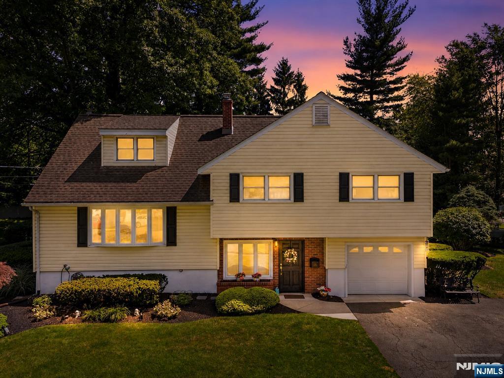 Welcome to this beautifully maintained sugar maple split-level home, offering approximately 2,100 square feet of living space in one of Westwood's most desirable neighborhoods. Featuring 4 generously sized bedrooms and 3 full bathrooms, including a primary suite with its own ensuite bath, this home provides the perfect blend of functionality and comfort. Tucked away at the end of a quiet cul-de-sac, you'll enjoy added privacy and minimal traffic. Step outside to your own private oasis featuring a heated salt water in-ground pool, newer trex deck, and a tranquil koi pond that creates the perfect setting for relaxation and outdoor entertaining. Conveniently located in one of Bergen county's most desirable communities, close to downtown shops, restaurants, parks, and transportation, this is an opportunity you won't want to miss. Book your showing before it's gone!