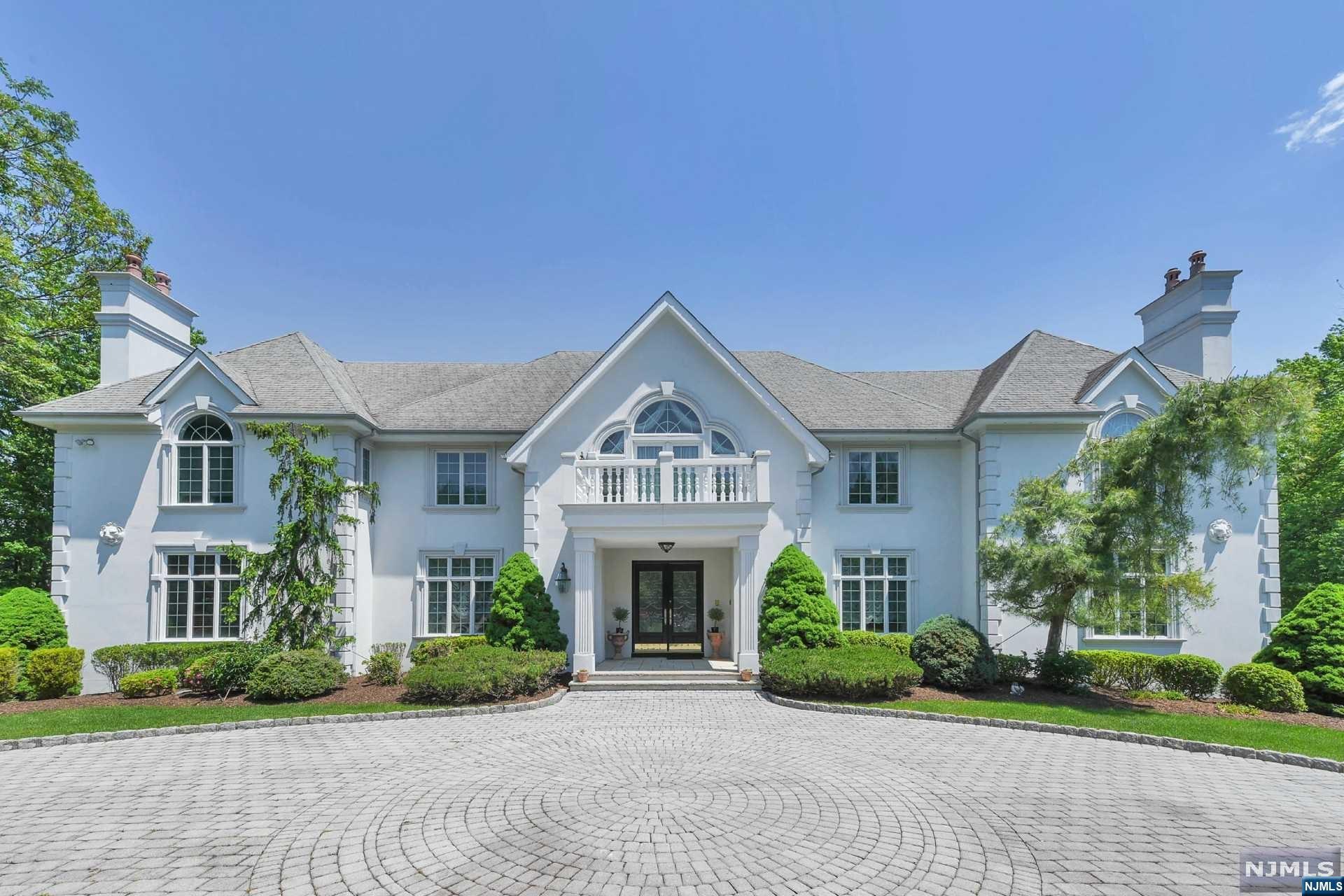 Gated custom built French Manor with circular paver driveway in sought after High Ridge area of town is situated majestically on 2 manicured acres with pool/spa/large paver patio and raised veranda offering spectacular views. Some of the elegant features offered include 6 fireplaces, extensive woodworking throughout, elevator to all floors and a 6 to 7 car garage. There is a large finished walk-out lower level with recreation room/fireplace, wet bar, gym, full bath and office. Wonderful floorplan, ideal for working remotely.