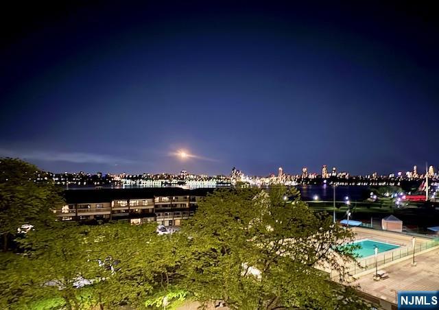 Discover Breathtaking Waterfront Living in Edgewater. Nestled along the picturesque River Road, this stunning 1-bedroom apartment offers an unparalleled living experience with sweeping Hudson River, New York skyline and George Washington Bridge views. This meticulously designed home epitomizes modern urban living, perfectly balancing comfort and sophistication. Step into an expansive open-concept floor plan featuring premium floors and a thoughtfully designed living space. The pass-through kitchen comes fully equipped with top-tier appliances, including a refrigerator, dishwasher, and microwave, making culinary adventures a pure delight. The generously sized bedroom provides a serene retreat, while the private glass balcony invites you to soak in breathtaking panoramic vistas. Residents enjoy an impressive array of amenities, including a 24-hour doorman, secured entry, and a gated community that ensures ultimate peace of mind. Stay active in the state-of-the-art fitness center, take a refreshing dip in the outdoor pool, or connect with neighbors in the welcoming communal spaces. Convenience meets luxury with nearby NYC transit bus at the development entrance and the Edgewater Ferry just minutes away. Explore nearby shopping centers, exceptional dining options, and entertainment venues that make this location truly exceptional. Included in the monthly rent: ALL utilities, Spectrum cable/internet package, building amenities, and a designated outdoor parking space number 116.