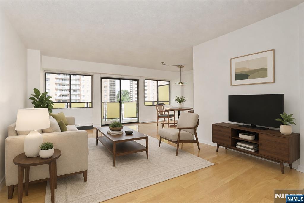 Luxury Hackensack Condo with Garage Parking â€“ All Utilities Included! No rental restrictions make this an exceptional opportunity for both homeowners and investors alike. Ideally located in the heart of Hackensack, this beautifully maintained 1-bedroom residence offers an inviting open layout with hardwood floors, abundant natural light, and a large private balcony perfect for relaxing or entertaining. The freshly renovated kitchen features elegant quartz countertops, and modern finishes, while the updated bathroom adds a stylish, contemporary touch. Comfort is ensured year-round with newer PTAC heating and air conditioning units. A true commuterâ€™s dream â€” just moments from NYC express buses, NJ Transit, and Hackensack University Medical Center. Stratford House is a full-service luxury high-rise offering 24-hour concierge/security, on-site staff, fitness center, laundry on every floor, indoor garage parking, and a private semi-circular driveway. HOA includes ALL utilities â€” electric, gas, heat, water â€” plus indoor parking. Financially stable building with a resident-led board and no assessments. Enjoy effortless, low-maintenance living in one of Bergen Countyâ€™s most convenient and desirable locations!