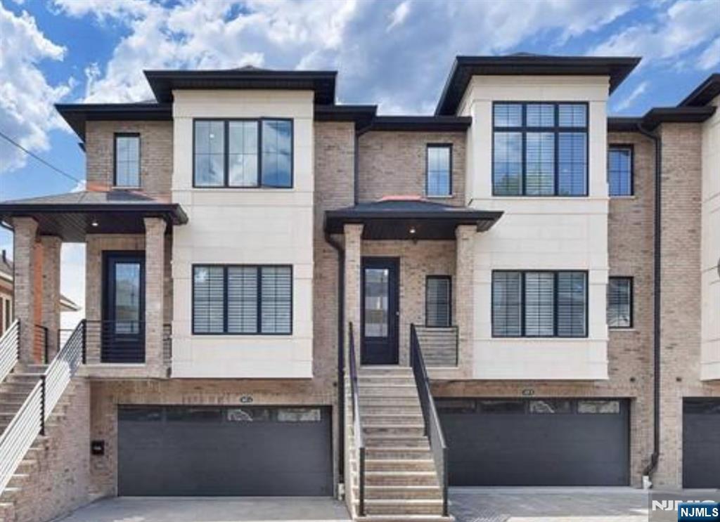 Rare RENT Opportunity for Luxury Living, Custom built side by side triplex. 4 bedrooms with vaulted 9â€™ ceiling each with its own bathroom, Total 4 full and 1 half baths, a gracious open floor plan, hardwood floors and abundant closet space. The kitchen is outfitted with custom cabinetry and upscale stainless steel appliances, center island & sliding glass doors to deck - a chef's delight! Master bedroom with walk in closet & spa-like bath with Jacuzzi tub. Radiant heat, gleaming hardwood flooring, video surveillance & security system, Bluetooth sound system, custom closets, central vac, full-size washer & dryer included! Above ground fully finished basement with access to patio. Deck overlooking breathtaking scenery, Inside 2 car garage plus 2 parking space. Located in great area for easy commute, shopping & dining options. Owner has NJ Real Estate License.