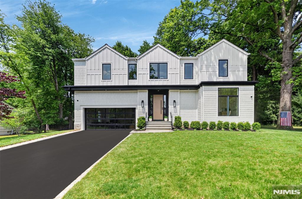 Spectacular brand new construction masterpiece in ultra-desirable Closter, featuring interior design by Allison Handler. This exceptional residence offers 6 bedrooms, 6.5 bathrooms, and a thoughtfully designed layout ideal for both everyday living and elevated entertaining. The main level welcomes you with a grand entry foyer, leading to a stunning great room with fireplace, a private den / office, and a designer chefâ€™s kitchen with a massive center island, seamlessly open to the spacious dining room. A first-floor bedroom and full bathroom provide outstanding flexibility and convenience. The second level is equally impressive, anchored by a spectacular primary suite complete with its own fireplace, dressing room, walk-in closet, and a luxurious spa-like bath featuring a soaking tub, double vanity, and oversized shower. Three additional junior suites, each with en-suite bathrooms, offer comfort and privacy, while a large second-floor loft/family room adds valuable bonus living space. The fully finished, amenity-rich basement is an entertainer and wellness enthusiastâ€™s dream, featuring a sauna, home gym, expansive recreation room, bar area, sixth bedroom with egress window, full bathroom, and abundant storage. Complete with a large deck, stunning backyard, and beautifully designed property, this home represents the pinnacle of new construction living. Vehicle charger in the garage.