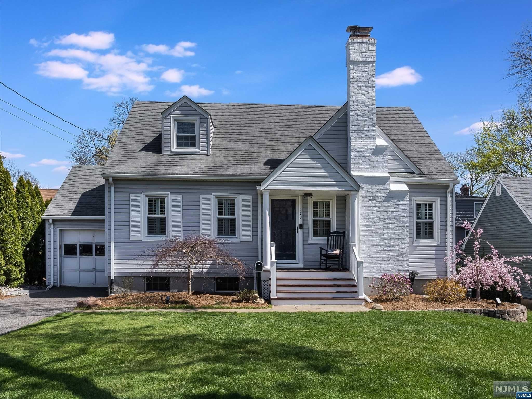 Perfect combination of charm & sophistication are presented in this captivating turnkey home tucked into a quiet Glen Rock neighborhood. Graced by hardwood floors & striking lighting, the rooms flow together enhanced by timeless updates. Remodeled kitchen boasts quartzite counters, high end SS appliances(including a Viking range) & large breakfast peninsula seating 4. Directly off the kitchen the dining room is accented w/wainscoting & a built-in beverage bar creating an elegant ambience for entertaining. When looking to unwind, bask in the glow of the sun filled living room w/gas fireplace. 2 new baths, 1 in crisp neutral tones, the other a stunning combo of ebony & cream, plus 3 large bedrooms complete this picture perfect home. Need more space? Lower level offers room for recreation & office, expansive storage & grade level walk out. Relax outdoors on the spacious deck or paver patio w/complete privacy provided by the tree lined back yard. All you need in this Glen Rock gem!
