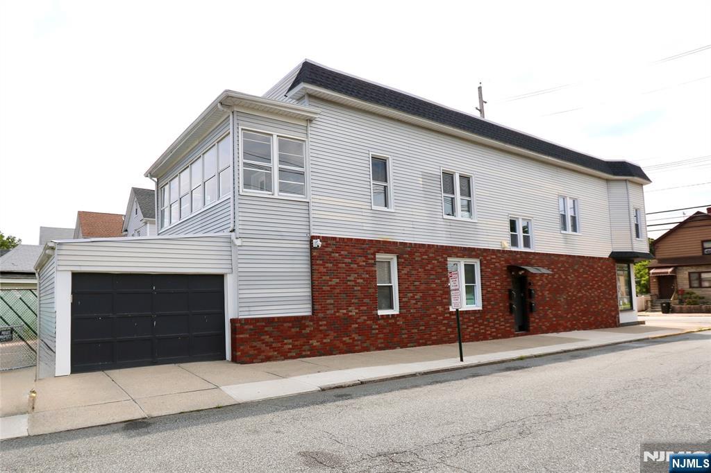 Experience modern living in this fully renovated 2-bedroom, 1-bathroom first-floor apartment. Designed with todayâ€™s lifestyle in mind, this beautifully updated home features a spacious living and dining area, a stylish kitchen with a breakfast bar, two generously sized bedrooms, a full bathroom, and a charming sun porch that offers the perfect space to relax or work from home. The contemporary kitchen showcases quartz countertops, premium stainless steel appliances, and modern finishes throughout. Additional highlights include central air conditioning, forced-air heating, and in-unit laundry hookups for added convenience. Ideally located near major highways and just steps from public transportation with direct access to New York City. Exterior security cameras provide added peace of mind. An attached garage is available for an additional $250 per month or the apartment may be rented without the garage. A perfect blend of style, comfort, and convenienceâ€”donâ€™t miss this exceptional rental opportunity in the heart of Wallington.