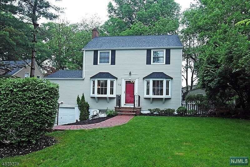 Welcome home! Charming center hall colonial in sought after Pleasantdale section. Bright and open main floor features wood flooring throughout. (2019) Updated eat-in-kitchen features a bay window with custom bench seating & storage, (2020) center island, granite counters, SS appliances include a Jennaire dual range, LG fridge, crown molding and recessed lighting. Continue into the living room with dual sided wood burning fireplace, bay window and crown molding. Step into the dining room which features a beamed cathedral ceiling, dual sided wood burning fireplace, bay window and crown molding. Upstairs has 3 bedrooms and main bath. Main bath & powder room renovated 2020. Newly finished basement & sump pump 2021. Beautifully landscaped ground with new patio and fence 2020 perfect for entertaining! New hot water heater, front stoop central air and shed.