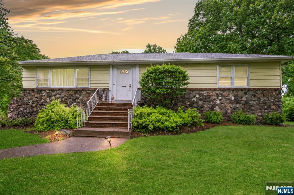 Nestled in West Orange's sought-after Mt. Pleasant neighborhood, this airy and bright ranch offers easy one-floor living, an open and connected layout and quick & easy access to NYC. The kitchen serves as the heart of the home, featuring a skylight that fills the space with natural light and opens to the family room, creating an inviting setting for casual nights at home, everyday gathering, or entertaining. The laundry area is conveniently located right in the kitchen, adding ease to daily routines. Step outside from the family room to the deck, perfect for grilling, relaxing, or enjoying the large, private yard. A formal living room and dining room provide even more space to spread out or host guests. The basement level offers flexible additional space for a gym, office, recreation room or family area, complete with a half bath and direct yard access and garage. Additional highlights include a primary bedroom with private bath, two-car built-in garage, central air, forced hot air, newer roof, and large driveway. Ideally located near schools, shopping, mass transit, and major routes, this home offers comfort, function, and convenient location.