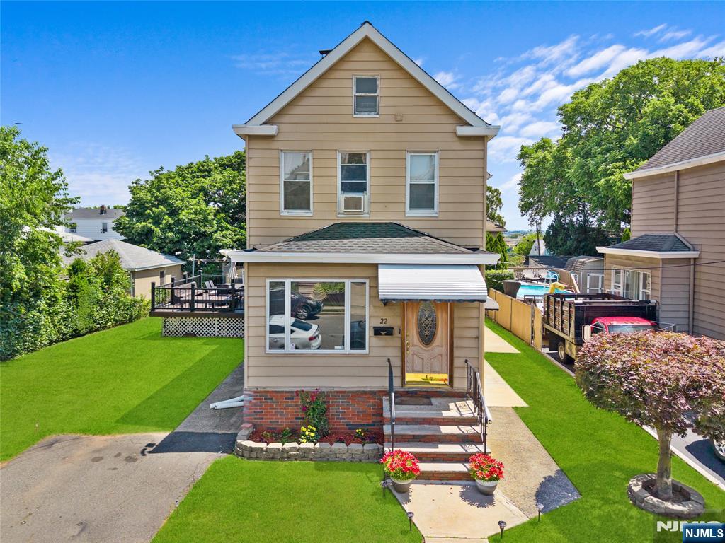 Welcome to this exceptional Colonial offering the perfect blend of space, comfort, and convenience in the heart of Clifton! This expansive 4-bedroom, 2.5-bath home features a thoughtfully designed layout ideal for everyday living and entertaining. The main level welcomes you with a bright and inviting living room, a formal dining room perfect for hosting family gatherings, and a spacious eat-in kitchen complete with a comfortable sitting area. Sliding glass doors lead to a large deck overlooking the backyard, creating the perfect setting for outdoor dining, relaxing, and entertaining. Upstairs, you'll find four generously sized bedrooms, including a spacious primary suite, along with two full bathrooms designed to accommodate today's lifestyle. The fully expanded basement offers an abundance of additional living space, providing endless possibilities for a recreation room, home office, gym, media room, or playroom. A newer roof adds even more value and peace of mind. Ideally situated in one of Clifton's most convenient locations, this home is just minutes from highly rated schools, New York City transportation, shopping, restaurants, parks, and major highways. Offering incredible space, functionality, and an unbeatable location, this is a rare opportunity to own a truly impressive home in the center of it all.