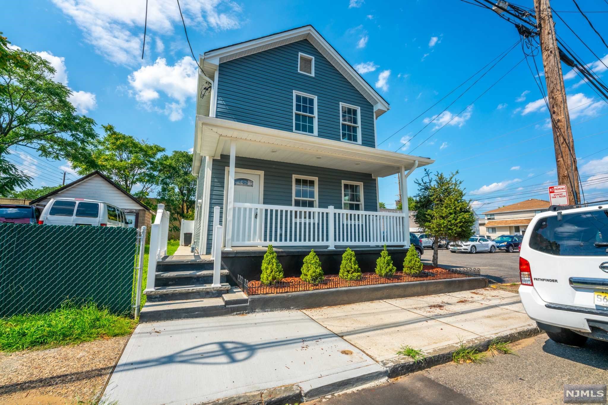 Your dream home awaits! Welcome to 10 Franklin St, a fully renovated 3 bedroom, 2.5 bath colonial home nestled on quiet street in the booming city of Hackensack. First floor features a gorgeous porch to enjoy a morning cup of coffee, a sun drenched living room, bright and airy open concept dining/kitchen with quartz countertops, island, and SS appliances and a half bath and laundry room. Upstairs you will find the master bedroom with en-suite bathroom and balcony, two additional bedrooms, and another full bath. Fully fenced-in white vinyl privacy fence and paved BBQ area- perfect for entertaining! Other features include hardwood flooring throughout, central AC, and express transit into NYC only steps away. Also in close proximity to Hackensack's growing downtown district. Come check this out today!