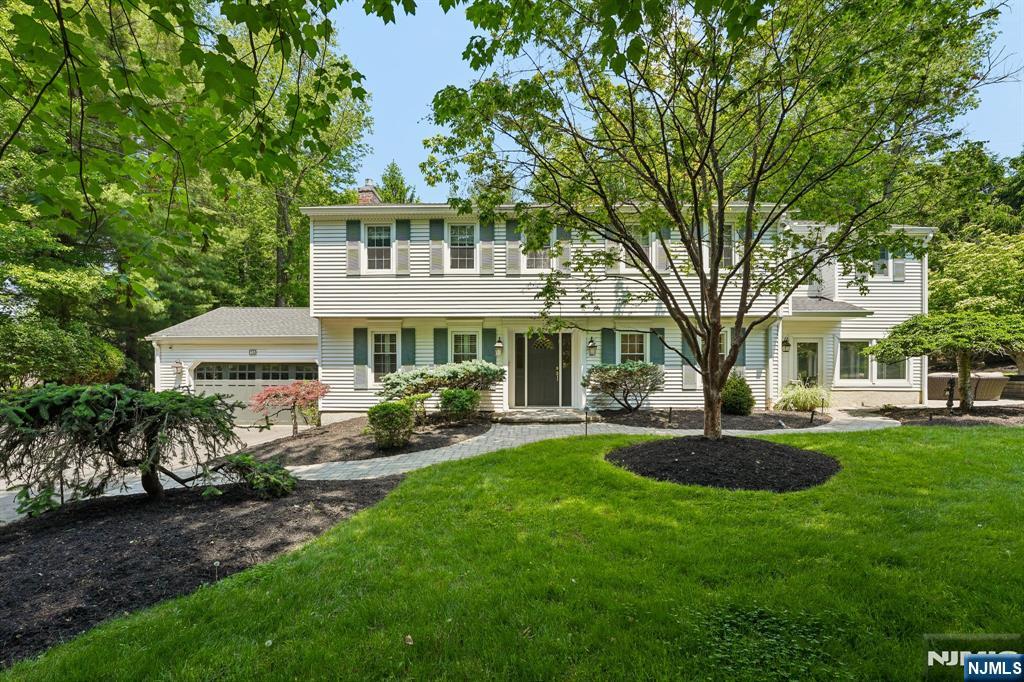 PERFECTION....DESIGNER SHOWCASE HOME IN THE HEART OR NORWOODâ€™S PREMIER EAST HILL. BEAUTIFULLY APPOINTED COLONIAL HAS IT ALL! FEATURING 5 BEDROOMS, 2 FULL AND 1 HALF BATH ON A PRIVATE ACRE OF SPECTACULAR RESORT LIKE PROPERTY. THE LIVING ROOM FEATURES HARDWOOD FLOORING, CUSTOM BUILT-IN CABINERTY AND FIREPLACE, NEW SPACIOUS GOURMET KITCHEN FEATURING CUSTOM CABINITRY, QUARTZ BACKSPLASH AND COUNTERTOPS, TOP-OF-THE-LINE-APPLIANCES, 2 BOSCH OVENS, MICROWAVE AND COOKTOP, SUB-ZERO REFRIGERATOR, WET BAR WITH WINE COOLER, HARDWOOD FLOORING, BUILT-IN PANTRY, COUNTERTOP SEATING FOR 5, EXPANSIVE SUN-FILLED DINING ROOM/SUN ROOM WITH SLIDING DOOR FLOWING EFFORTLESSLY INTO THE REAR PAVER PATIO, BEAUTIFULLY LANDSCAPED PROPERTY AND ENTERTAINMENT SPACE FOR ALL OF YOUR SUMMER NEEDS, GORGEOUS UPDATED GUEST POWDER ROOM, FAMILY ROOM AND NEW LAUNDRY ROOM COMPLETE THIS LEVEL. THE 2ND FLOOR FEATURES A PRIMARY SUITE WITH 2 WALK-IN CLOSETS, DRESSING AREA AND UPDATED BATHROOM. FOUR ADDITIONAL BEDROOMS AND UPDATED HALL BATHROOM. DESIGNER QUALITY FINISHES THROUGHOUT!! LOWER LEVEL FEATURES A REC AREA AND 2-CAR GARAGE. NORWOOD OFFERS BLUE RIBBON SCHOOLS, AMAZING REC SPACES, CLOSE TO SHOPPING AND NYC...INCREDIBLE OPPORTUNITY TO OWN THIS METICULOUSLY MAINTAINED, VERY SPECIAL HOME.