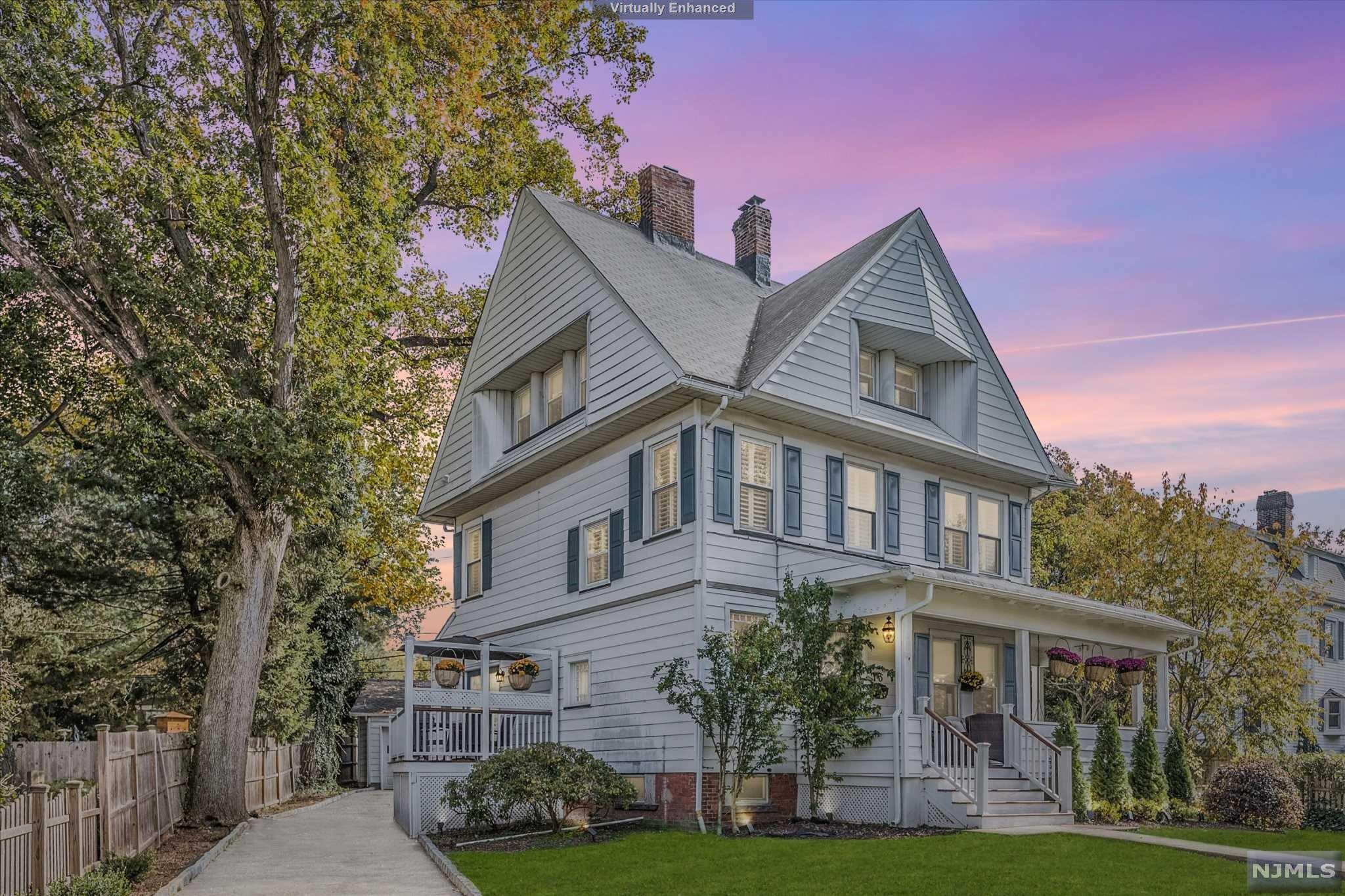 Come through the beautifully restored front door to a gracious foyer w/tin ceiling, gleaming hw floors & FP w/original decorative mantel. The large sunny DR can accommodate a crowd & opens through pocket doors to the fantastic living room w/corner FP & gorgeous windows w/plantation shutters. The EIK is beautifully updated w/butcher block counters, stainless appliances & plenty of white cabinetry. A powder room & French doors to the new Trex deck completes the 1st floor. The 2nd floor has 3 generous & sunny BRs, all w/plantation shutters and hw floors. A sweet office w/built-ins & updated full bath round out this flr. The 3rd flr offers 2 add'l BRs, an additional full bath. There are updates incl CAC, electrical & water heater. The fully fenced yard, including a driveway gate, a private playground for young & old with lots of space, an oversized 2 car gar & additional parking. With a location that can't be beat " so close to NY trains, parks, shopping & dining.