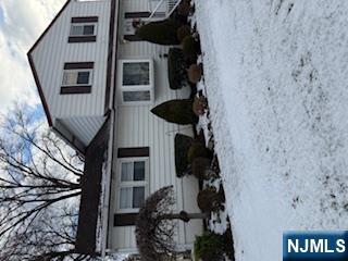 A true diamond in the rough! Fantastic location, beautiful property! This sunkissed home offers unlimited potential to create your dream home! beautiful l/r with huge bay window, eik with ample cabinets and side entrance, lovely, inviting d/r w/huge bay window, primary b/r w/double closet, bright and airy second b/r, updated full bath w//juauzzi. Second floor boasts two huge b/r's, attic storage, full bath (non functioning). Add beautiful h/w floors under carpeting, detached one car garage, huge bsmt rec room w/classic retro bar, newer stove, refrigerator and w/d and you may have finally found the house you have been waiting for. dont make the mistake of missing this one!! Home being sold "as is"