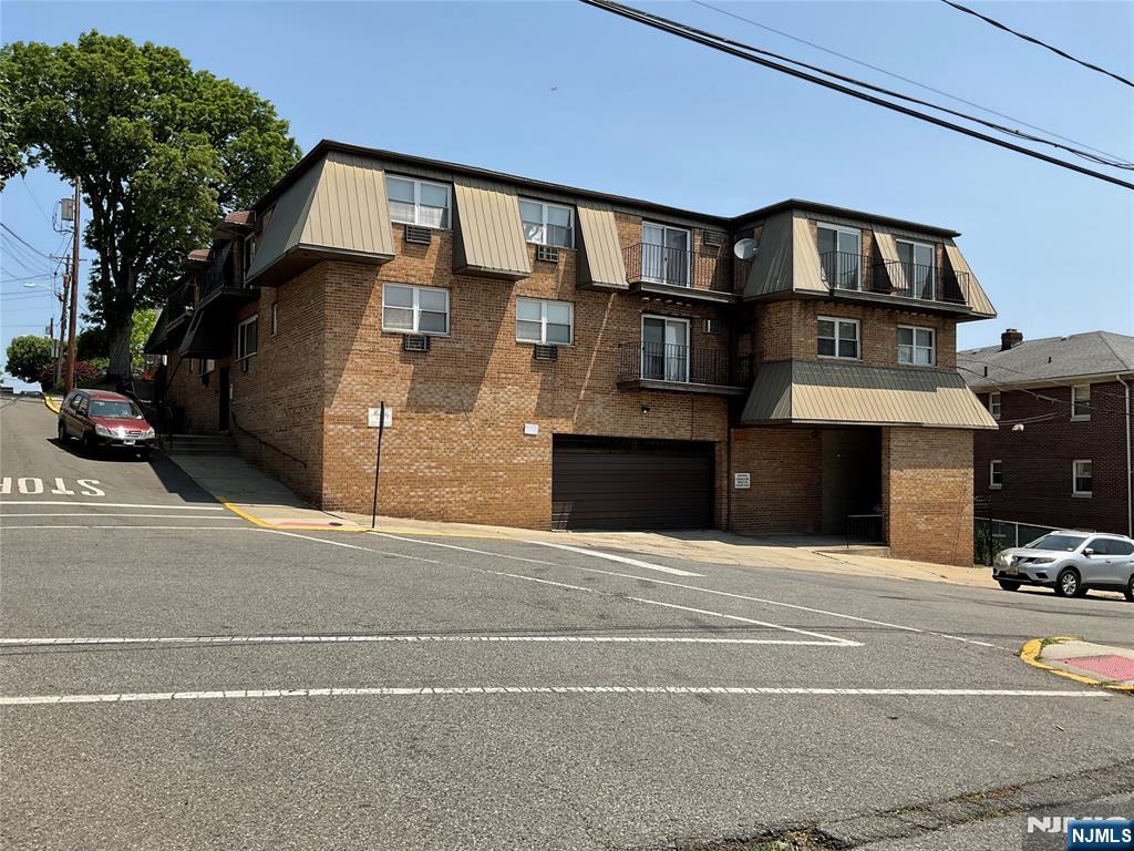 Freshly painted 2nd floor apt. convenient to transportation features hardwood floors & one car indoor garage parking. Heat & hot water are included in rent. Coin-operated laundry in basement. No pets, please.