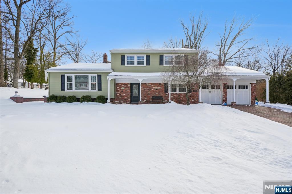 Welcome home to this spacious bi-level property, ideally situated on a desirable corner lot. This home is filled with natural light and features a modern kitchen complete with stainless steel appliances. Designed for both everyday living and entertaining, the home offers generous indoor and outdoor space. Highlights include recessed lighting throughout and cozy wood burning fireplace in the family room which opens through French doors to the patio. Step outside to your private fenced backyard featuring an in ground pool perfect for summer entertaining. a must see home ready for its next owner