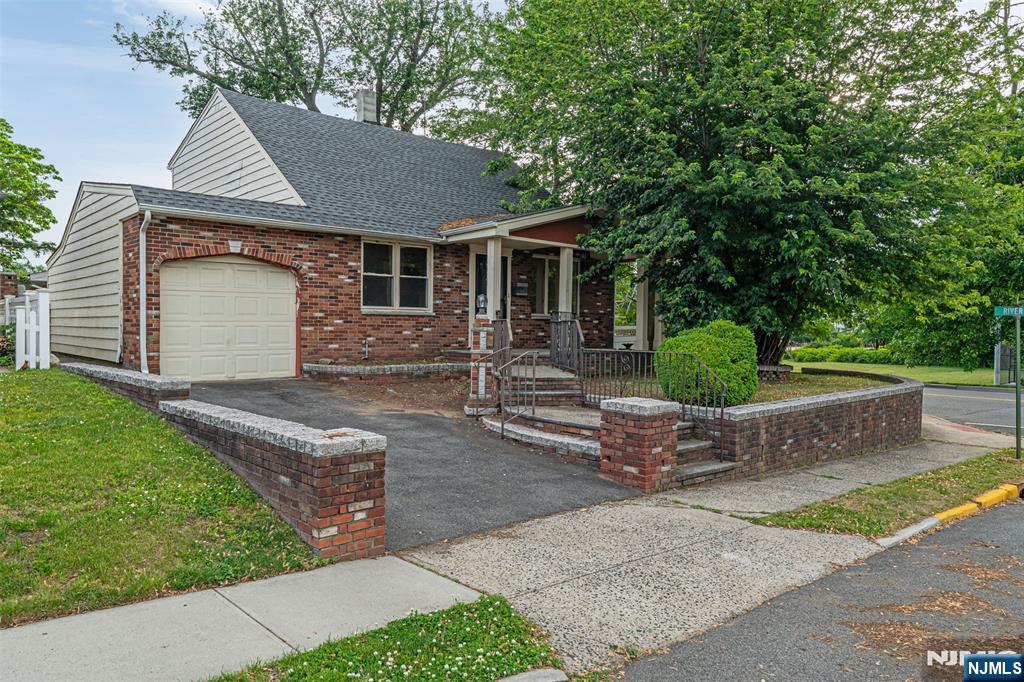 Welcome to this beautifully updated 3-bedroom, 2.5-bath Cape Cod in the heart of North Arlington. From the moment you walk in, the home blends classic character with modern updates, creating a warm and inviting feel throughout. The main living areas flow comfortably into an updated kitchen with modern finishes, while the layout offers flexibility across multiple levels. Upstairs features well-sized bedrooms, including a spacious setup, while the finished walkout basement adds another level of everyday living with direct backyard access. An attached garage and additional storage complete the home's functionality. Natural light fills the interior, highlighting the finishes, updated bathrooms, and comfortable design throughout. Located in Bergen County, North Arlington remains a favorite for commuters thanks to its quick access to NYC, major highways, shopping, restaurants, parks, and surrounding towns including Rutherford, Lyndhurst, and Nutley and only 35mins from NYC and major hubs.