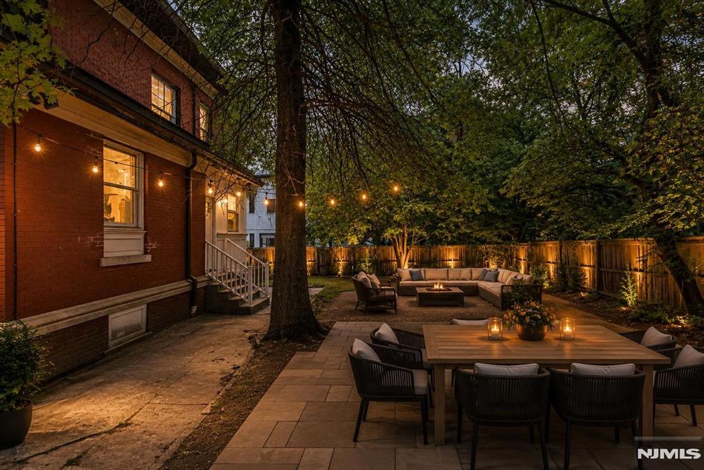 Meticulously renovated, this historic 5-bedroom, 2.5-bath American Foursquare brick home sits on a rare, oversized 100x100 lot in Weehawken. The three-level layout seamlessly blends preserved turn-of-the-century detailsâ€”like stunning inlaid parquet floors and original moldingsâ€”with modern upgrades, including 3-zone central A/C, updated plumbing/electric, and hardwired ethernet. The home features spacious living areas, a formal dining room, and extensive attic storage. Outdoor highlights include a classic front porch, parking for 3+ vehicles, and massive grounds with rare potential for expansion. Ideally located near parks, top-rated schools, restaurants, and direct NYC transportation. All photos have been virtually staged.