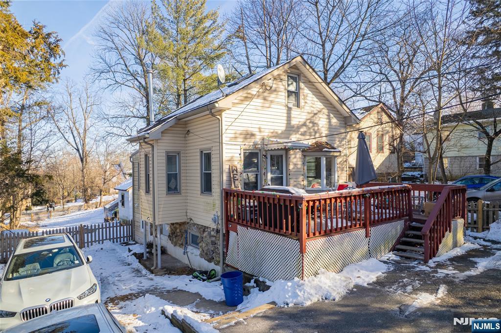 Charming Home in Towaco (Montville Township) Situated on a quiet street, this 2-bedroom, 2-bath home sits on a 50x200 fully fenced-through lot with public water and sewer and low taxes all within the highly desirable Montville school district. An excellent alternative to apartment living, this property offers strong upside with some updating, or a rare opportunity for a buyer to expand, remodel, or customize to fit their vision. The deep, lot provides ample space for future improvements, outdoor living, or an addition.
