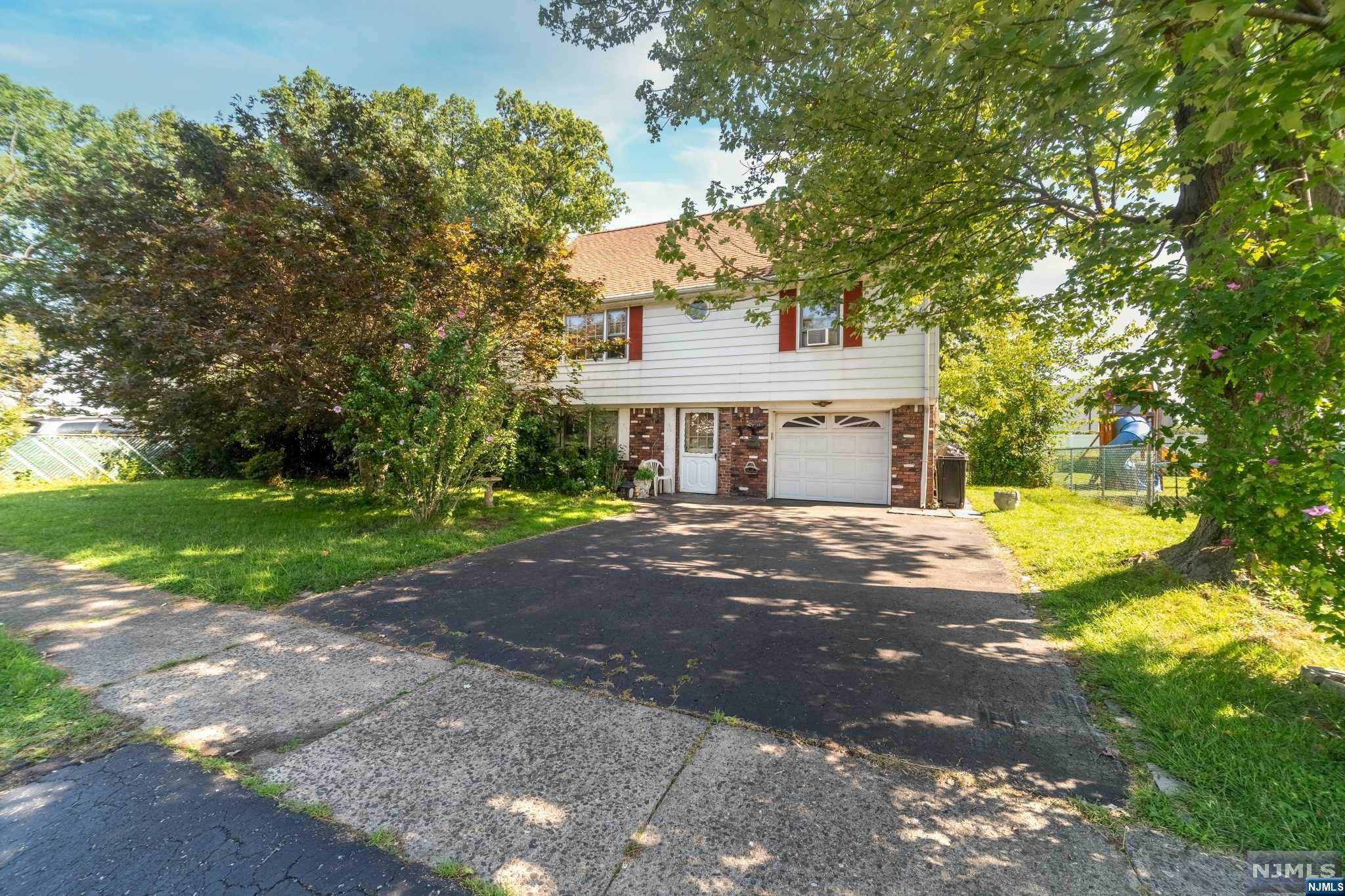 H&B Due Monday (11th) @ 5pm. Calling all contractors, investors, DIYers, and flippers! Location, Location, Locations! Situated in a lovely neighborhood, right off rt 46. 1st floor can be further finished/renovated, has laundry, separate entrance, and half bath currently. 2nd Floor has kitchen, living room, dinning room, full bath, and 2 bedrooms. There is a walk up 3rd floor with a dormer so it can be finished into more living space (possibly a beautiful primary bedroom with en-suite and walk in closest). The possibilities are endless. Level, fenced in lot, with 1 car attached garage. Teterboro airport minutes aways! Only 15 minutes to NYC. Diamond in the rough! Bring your vision! Sold As-Is. Home is currently occupied. All items and garbage are to be left behind (responsibility of the buyer). Must have confirmed appointment. DO NOT GO WITHOUT CONFIRMED APPOINTMENT. Please view 3D Tour & Floor Plan before scheduling.