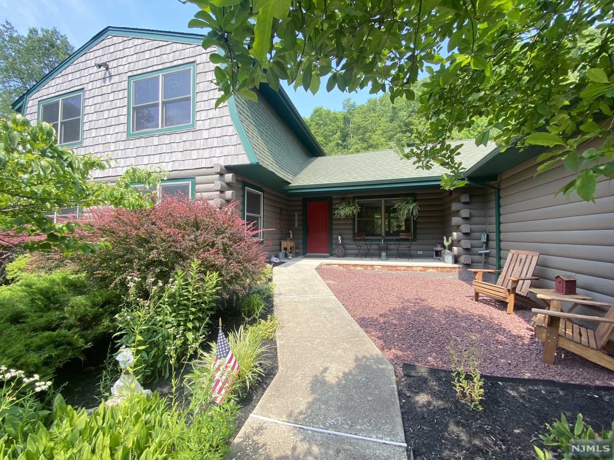 Stunning wide open floor plan, great for entertaining, tons of storage space, set back from the road this custom home is immaculate and move in ready! All new flooring, baths, updated kitchen, LARGE family room and living room, Amazing Kinnelon Schools - level sun-filled yard - fenced back, outbldg