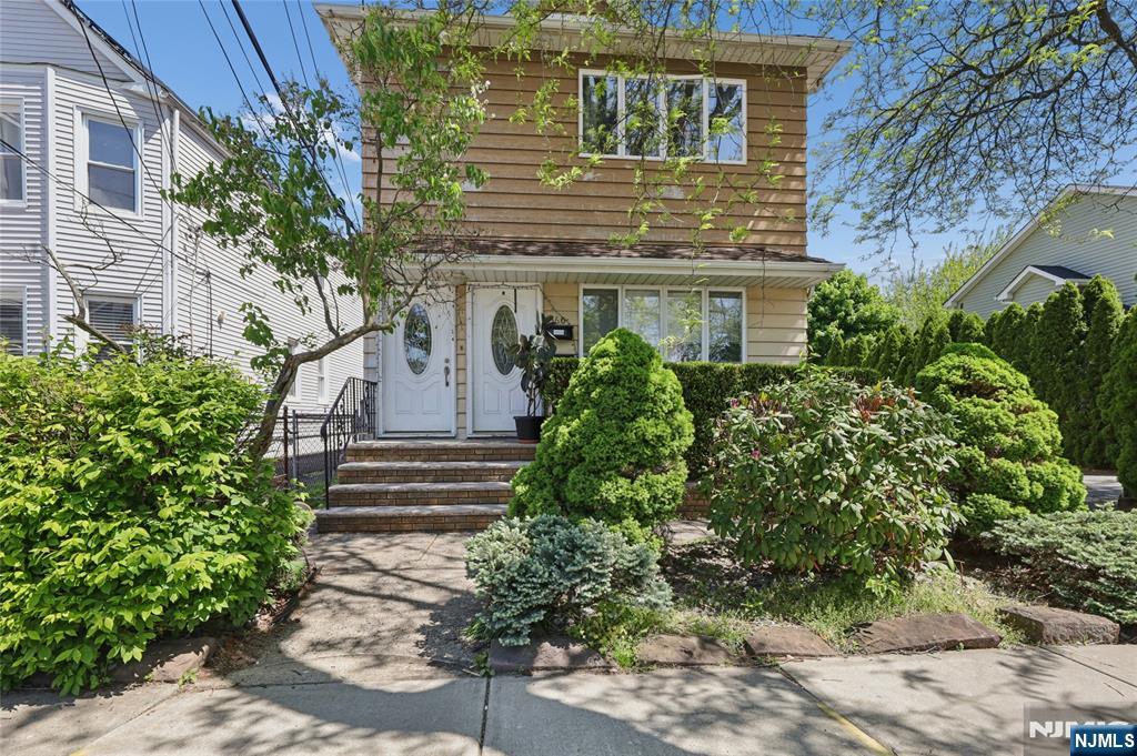Centrally located in Clifton, this Unique Two-Family Home offers 4 Bedrooms and 3 Full Bathrooms, along with a Finished Basement and Attic providing additional Living Space. The Lot is Large and allows for many expansion possibilities. Garage is Detached and has an Outdoor Carport.