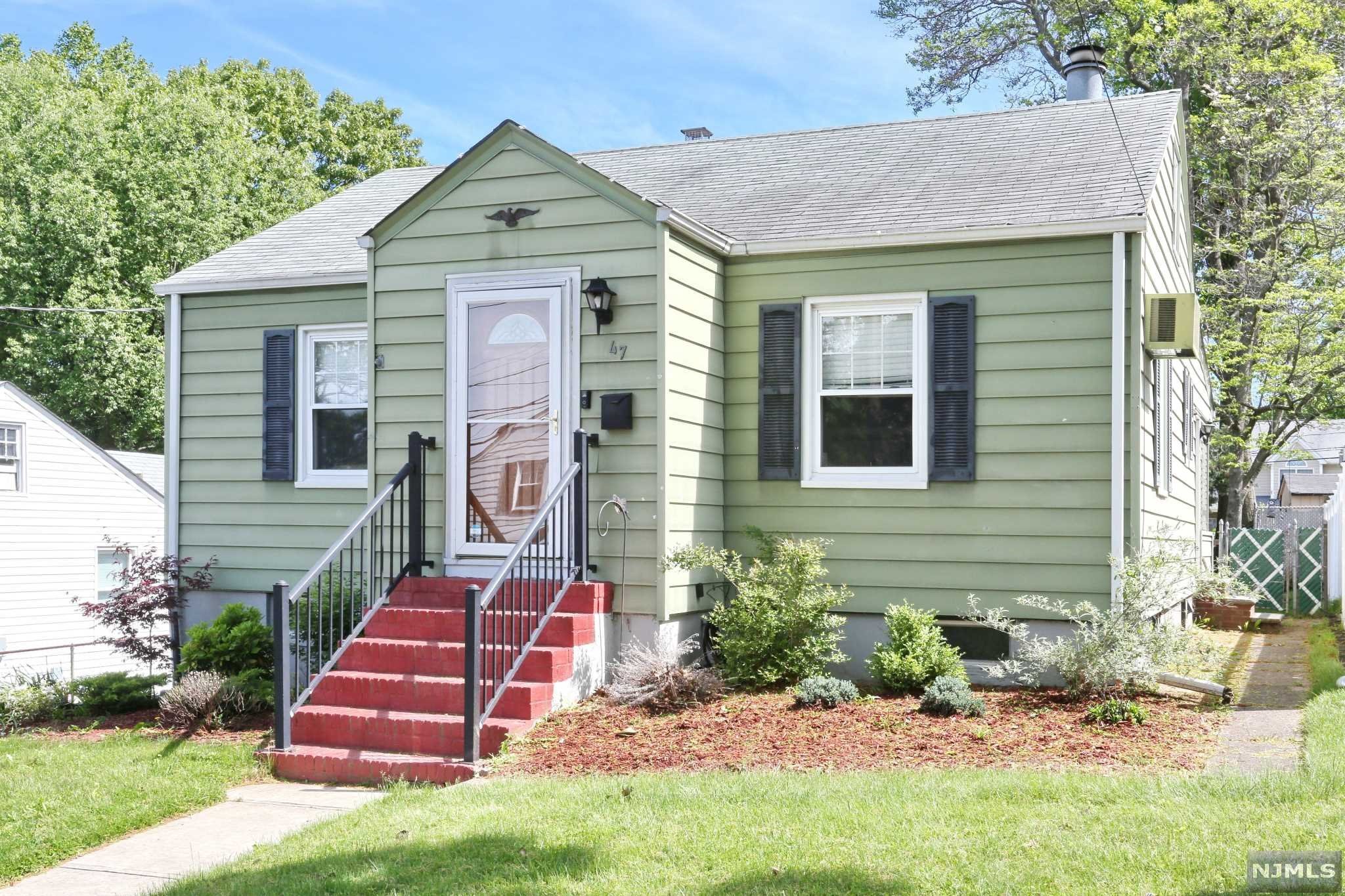 This beautifully redone Ranch Home sits on a tree-lined street in the highly desirable Hasbrouck Heights. With thoughtfully landscaped grounds that warmly invite you into the front yard. Upon entrance, you are greeted by hardwood floors and an original wood burning stove in the Living Room. Adjacent to the living room, there are two comfortable bedrooms and a full bathroom. The charming Eat In Kitchen has lots of Cabinet Space. Very Large 3 Season Room with a back door leading out to the large Rear Deck and huge backyard that is great for entertaining! The Renovated Basement is fully finished with a bar area, large laundry room, and Ground Level Access to the 3 Car Driveway. Ceiling Fans Installed in all rooms and Hardwood Floors Throughout. In close proximity to shopping & restaurants and complemented by the sought after Hasbrouck Heights School System. Don't miss out to get in this gorgeous starter property. This home will not last! Call Today for your Personalized Tour.