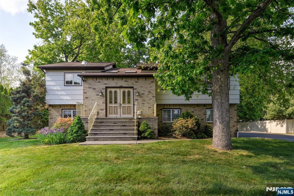 Nestled in one of Wayne's most sought-after neighborhoods, this spacious 4-bedroom, 2.5-bath home offers an exceptional opportunity to create the lifestyle you've been looking for. Set on a level lot, the home features a large eat-in kitchen, formal dining room, beautiful wood floors, a walk-out basement, and an attached 2-car garage. Generous living spaces throughout provide flexibility for a variety of needs, while the expansive layout offers endless possibilities to personalize and maximize its potential. Ideally located near local amenities, parks, shopping, dining, and transportation, this property presents a rare combination of size, location, and opportunity in a highly desirable Wayne setting.