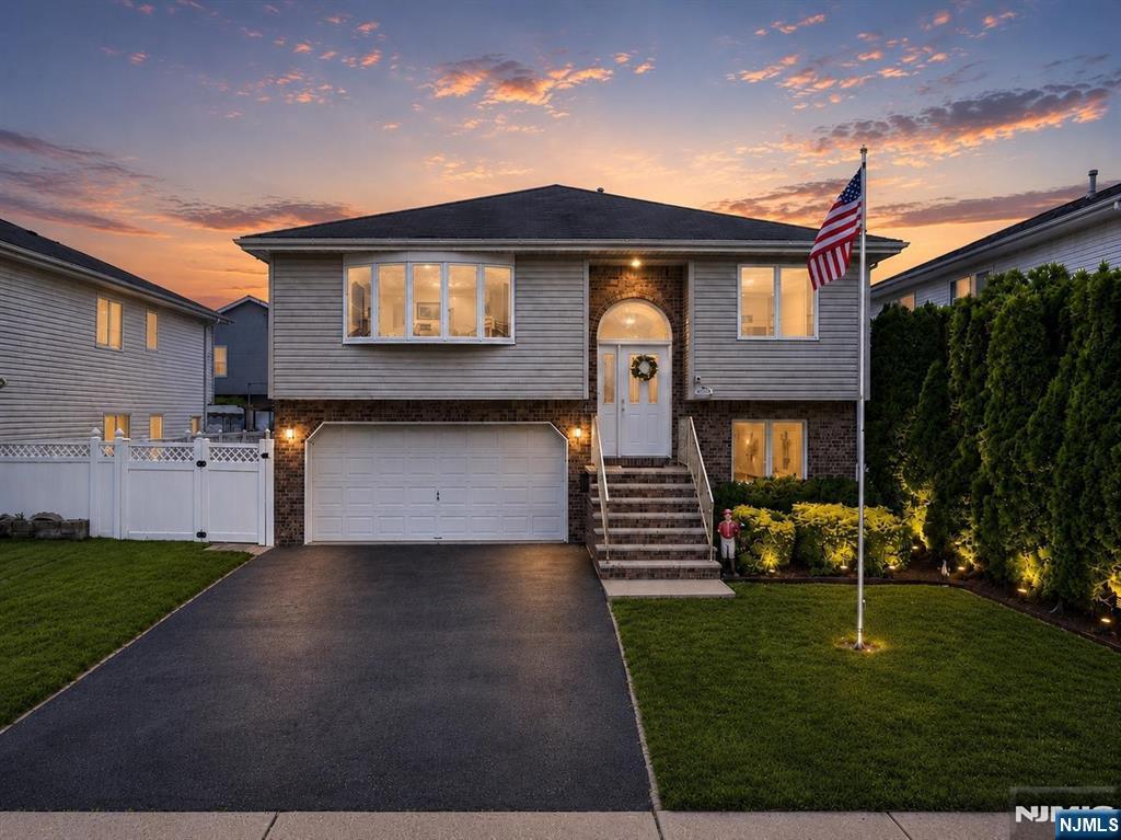Spacious, open, and built with a flow that feels intentional at every turn, this Saddle Brook bi-level is the kind of layout that's genuinely hard to find at any price point. The main level opens into a large, sun-filled living and dining area, anchored by a kitchen with great flow and a raised deck perfect for morning coffee or weekend entertaining. Three bedrooms round out the upper level, including a primary suite with its own full bath. Downstairs, the ground floor is where this home really separates itself: a fourth bedroom, dedicated office, den, full bath, and laundry all connect seamlessly to a two-car garage and a full walkout to the backyard. Two levels, endless flexibility, and a canvas that's ready for its next chapter.
